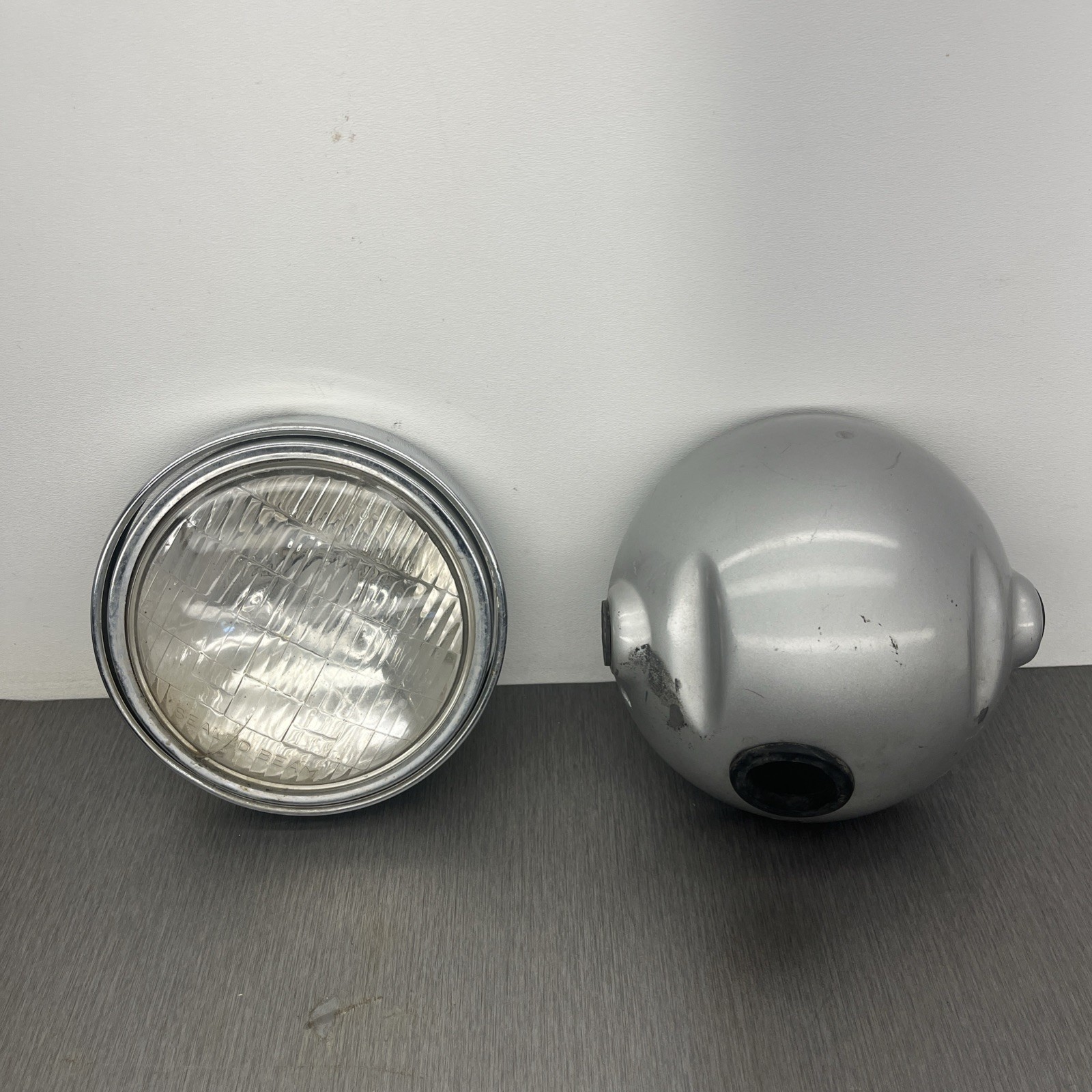OEM 1974 - 1976 YAMAHA DT175 HEADLIGHT BUCKET and RIM 