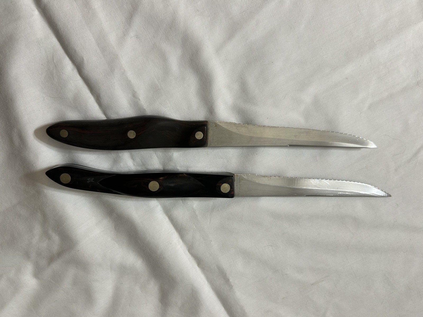 Vintage 2 Cutco serrated knives 4.25” Blades 9”& 10” Vintage 2 Cutco serrated knives 4.25” Blades 9”& 10”