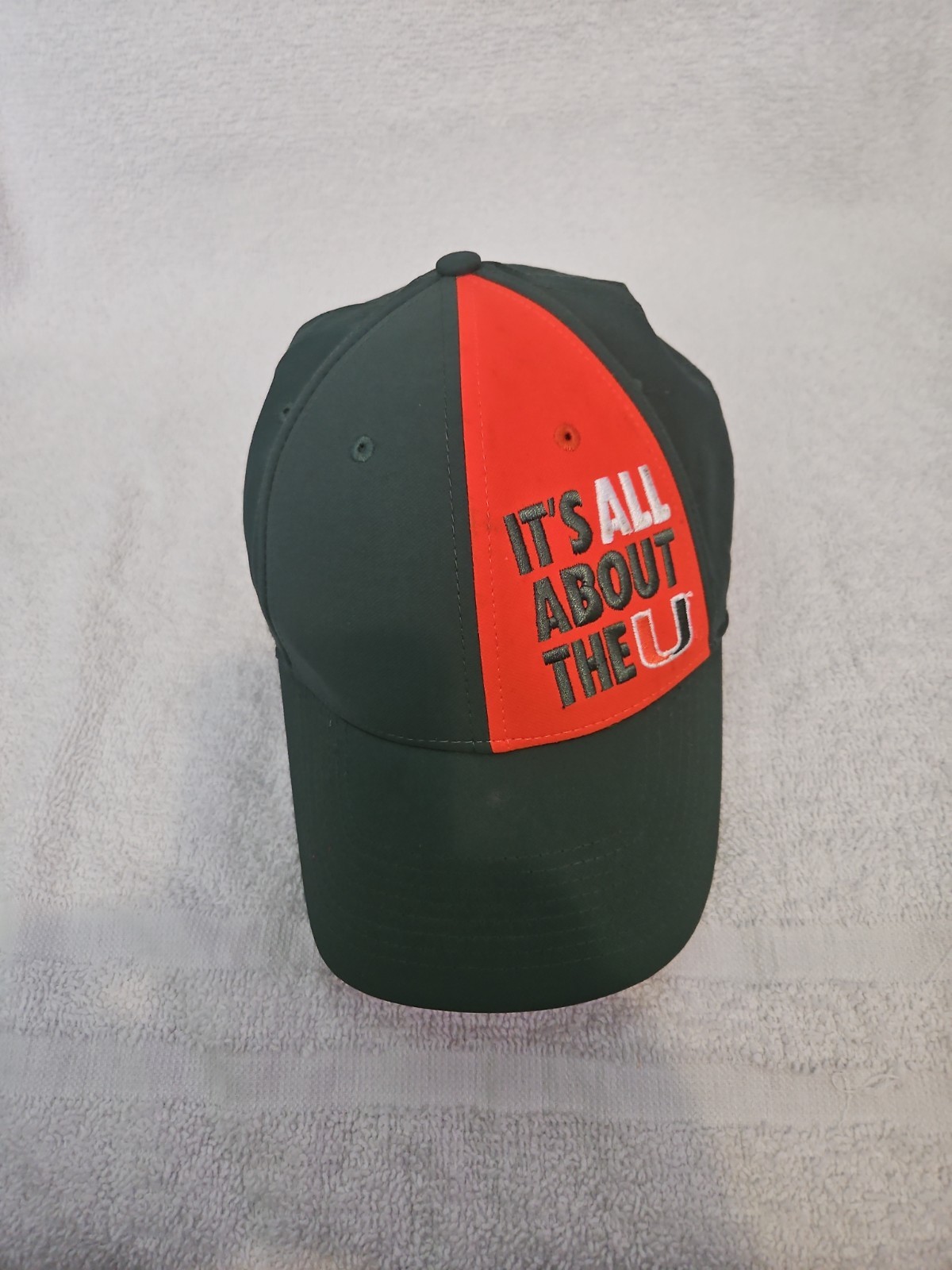 Nike IT\'S ALL ABOUT THE U CAP. GREEN/ORANGE