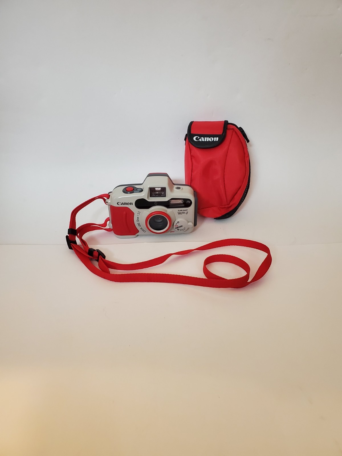 Vintage Canon Sure Shot WP-1 35mm Point & Shoot Film Camera w/ Case & Lanyard