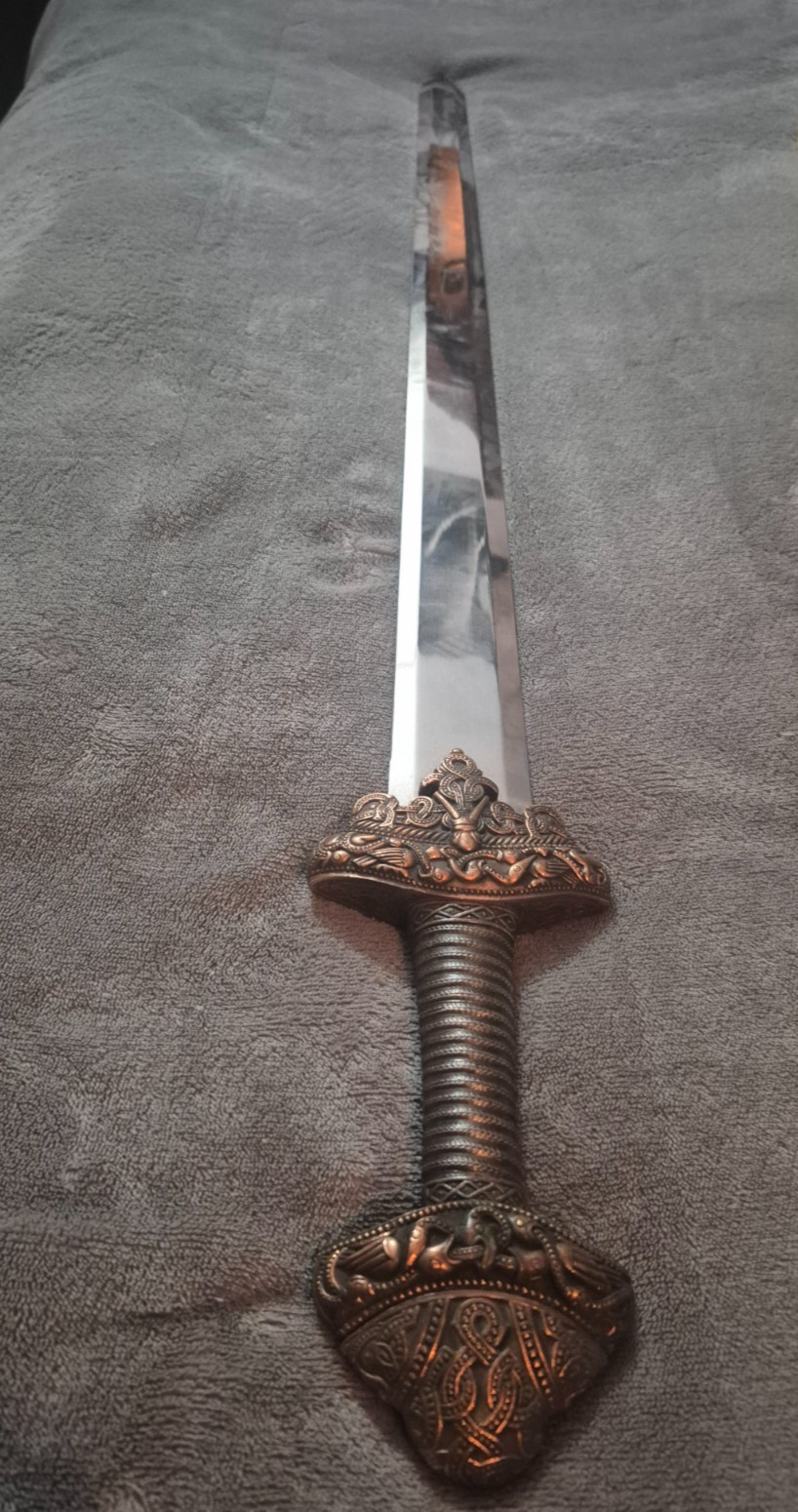 full-size decorative/fantasy sword, roughly 39–40 inches long full-size decorative/fantasy sword, roughly 39–40 inches long