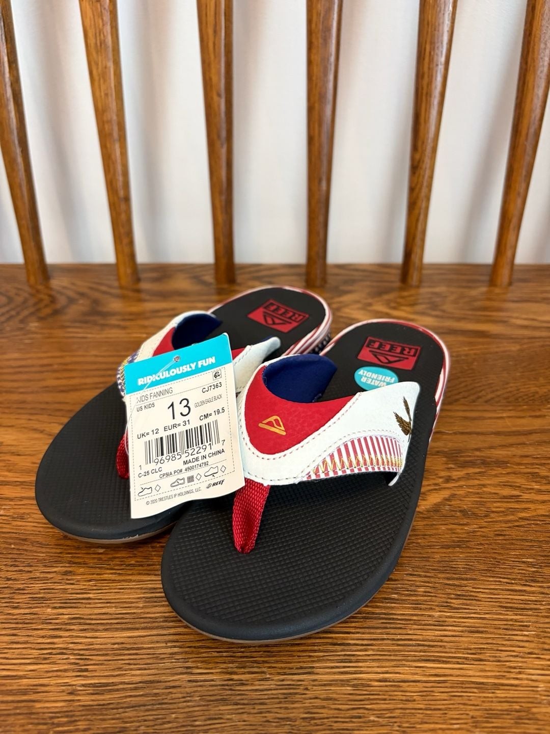 Reef Kids Fanning Flip Flop Sandals Golden Eagle Black Reef Kids Fanning Flip Flop Sandals Golden Eagle Black