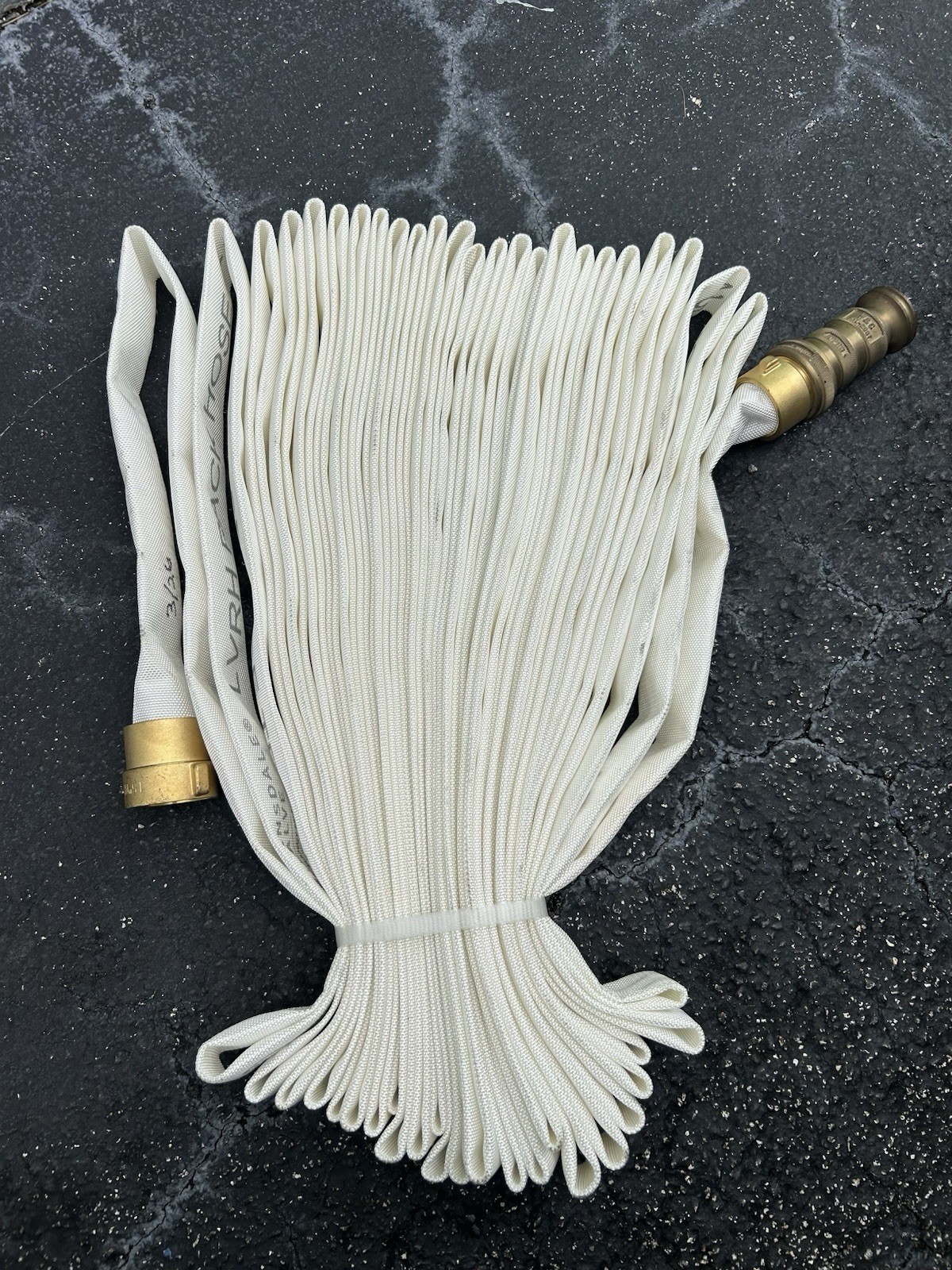 Fire Hose. 1-1/2” X 100’. 2026 With Heavy Bronze Nose. Excellent Cond. Fire Hose. 1-1/2” X 100’. 2026 With Heavy Bronze Nose. Excellent Cond.