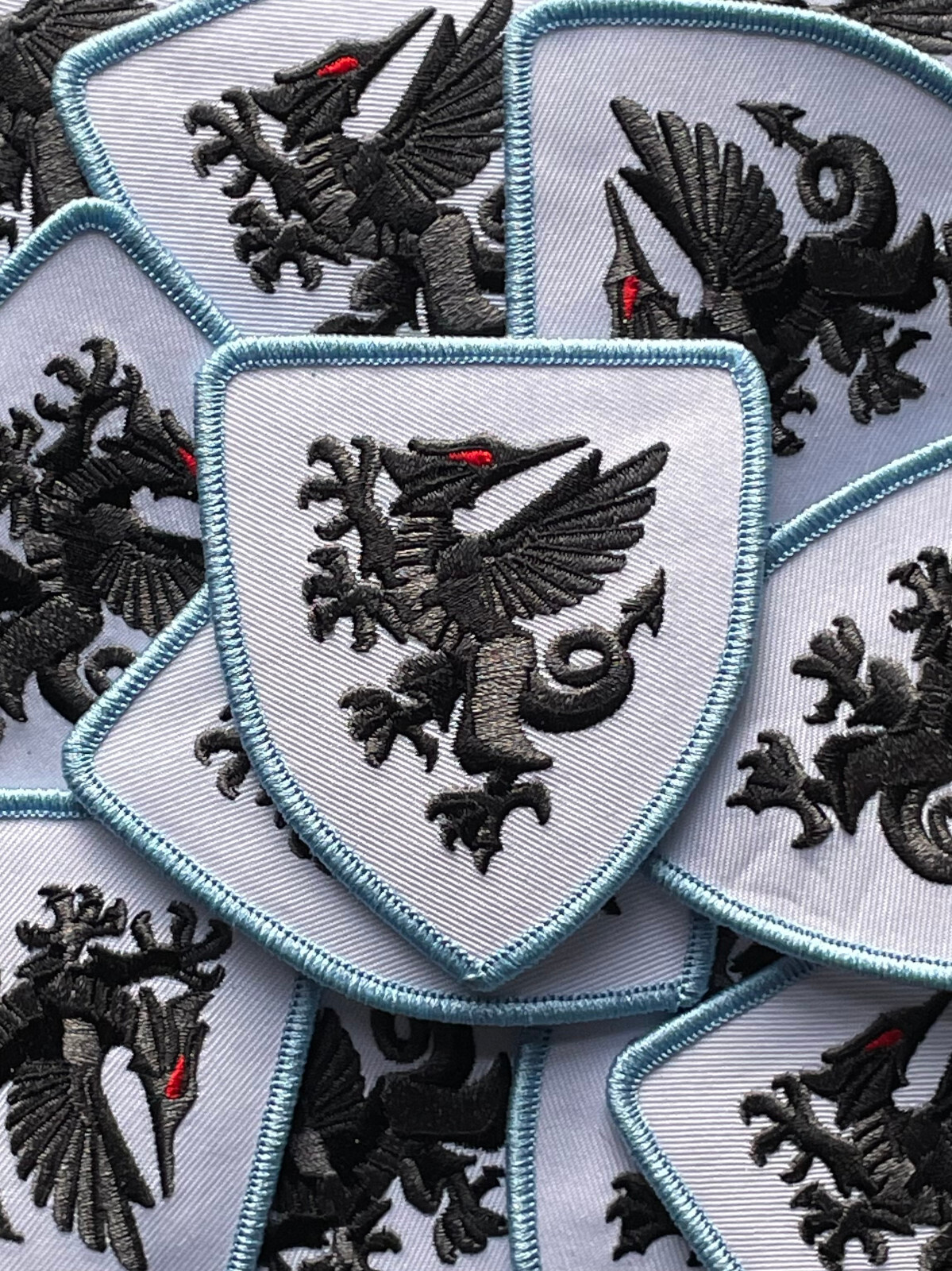 MNUFC/FA Wales Embroidered Patch - Black, Blue, Grey