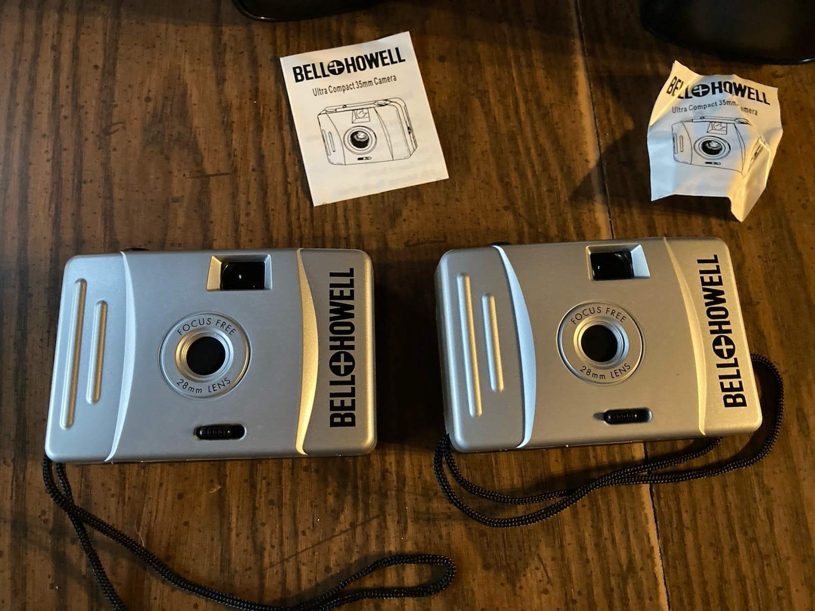 2 Bell & Howell 35mm Vtg Ultra Compact Cameras Focus Free w Cases Mint UNTESTED