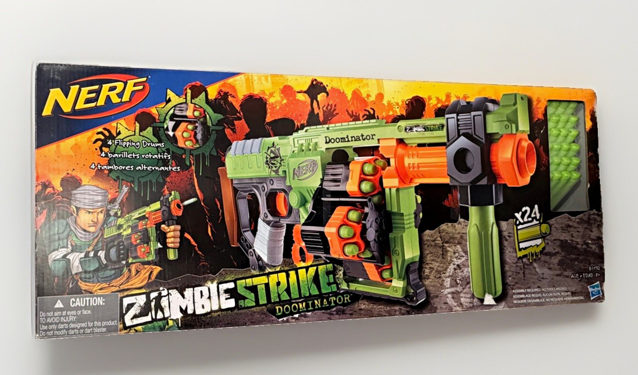 NERF Zombie Strike Doominator Blaster B1532 NEW Sealed In Box NIB Hasbro NERF Zombie Strike Doominator Blaster B1532 NEW Sealed In Box NIB Hasbro