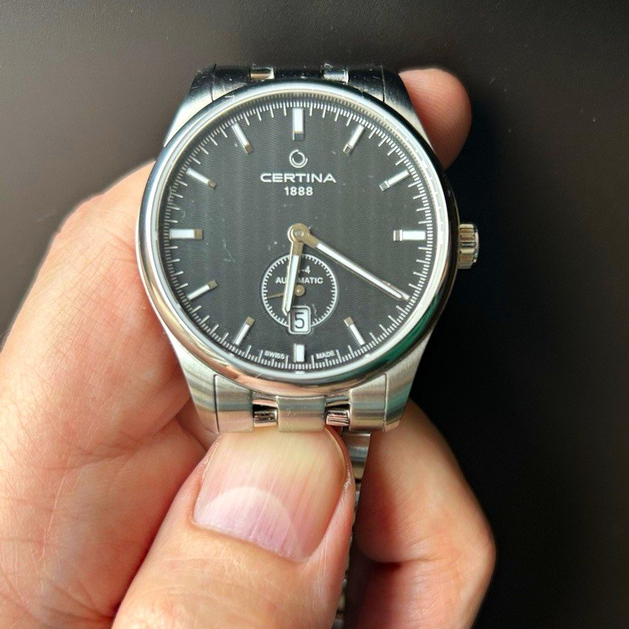 Certina 1888 Automatic 100m 40mm Black Textured Dial Date SS Bracelet. Certina 1888 Automatic 100m 40mm Black Textured Dial Date SS Bracelet.