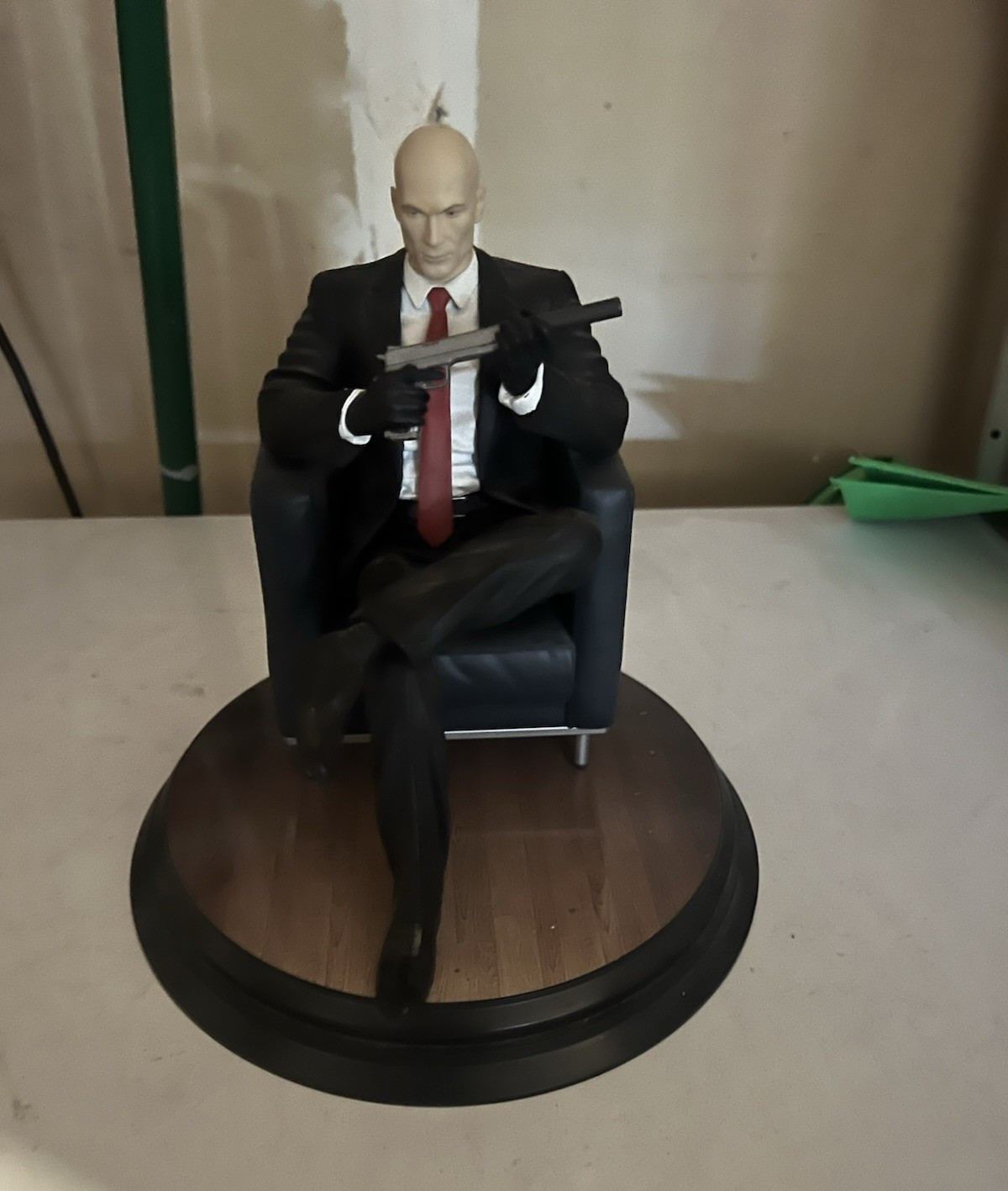 IO Interactive A/S 2015 Seated Bald Assassin Figurine Plastic Display Base