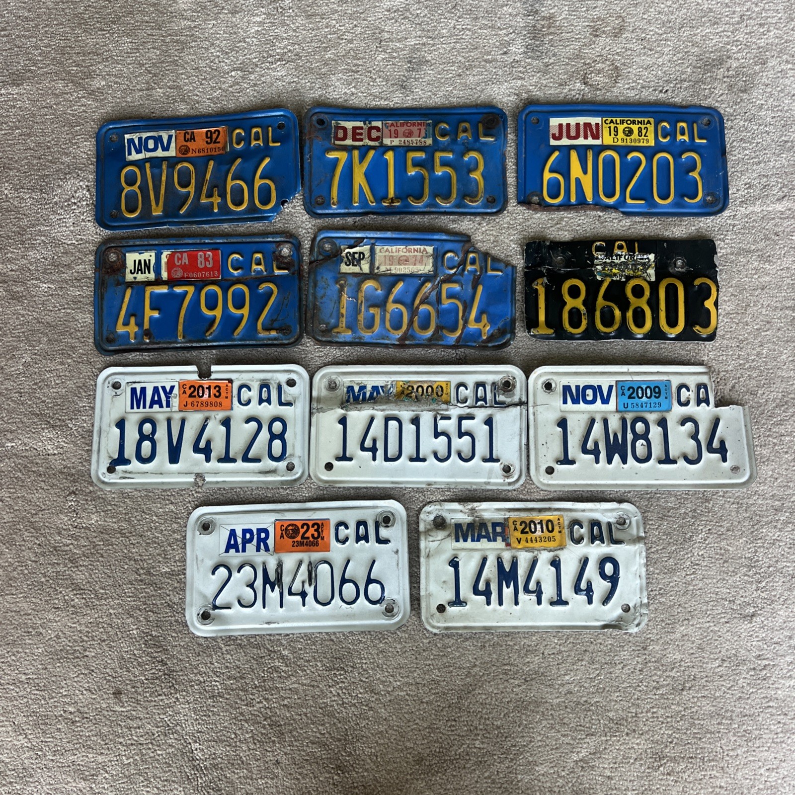 LOT OF  ELEVEN (11)  VINTAGE CALIFORNIA MOTORCYCLE LICENSE PLATES