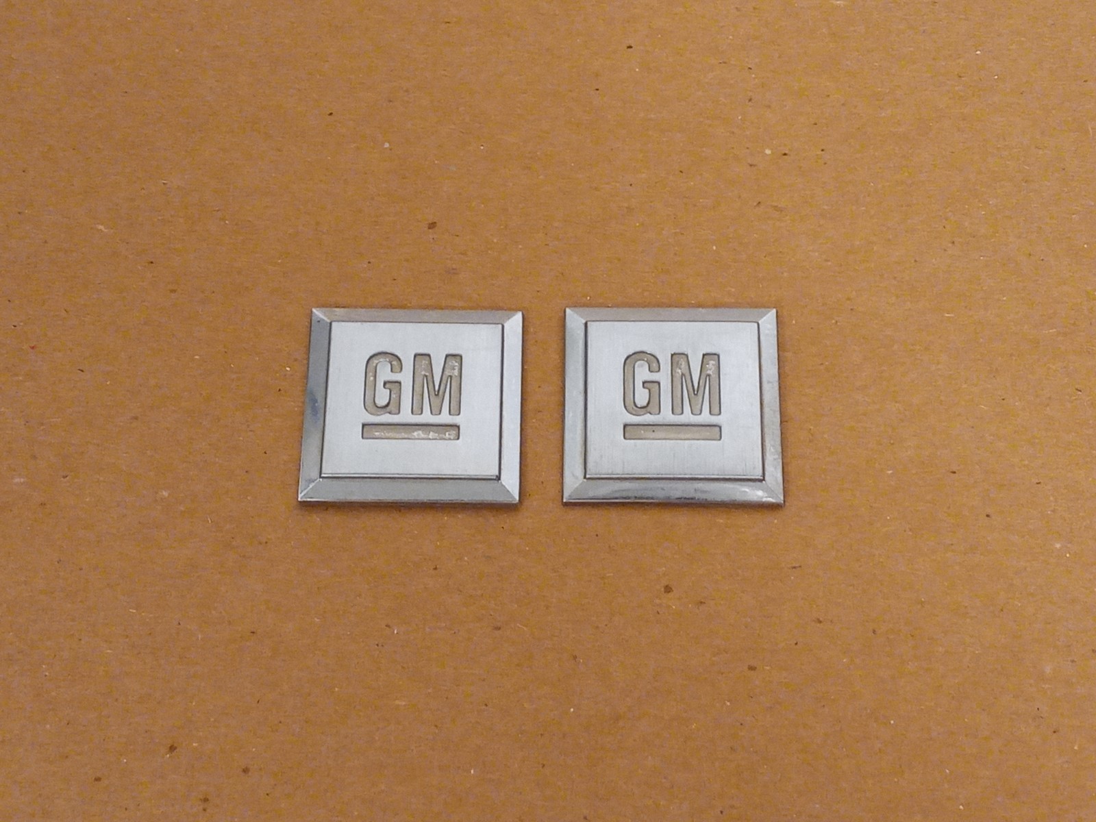 (2) Big GM Mark of Excellence Square Fender Emblems Rear Deck Lid Badge OEM USED