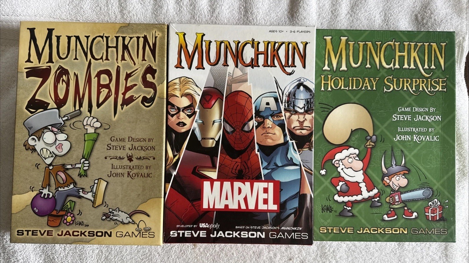 Munchkin card game Munchkin Marvel + Muchkin Holiday Surprise + Munchkin Zombies Munchkin card game Munchkin Marvel + Muchkin Holiday Surprise + Munchkin Zombies