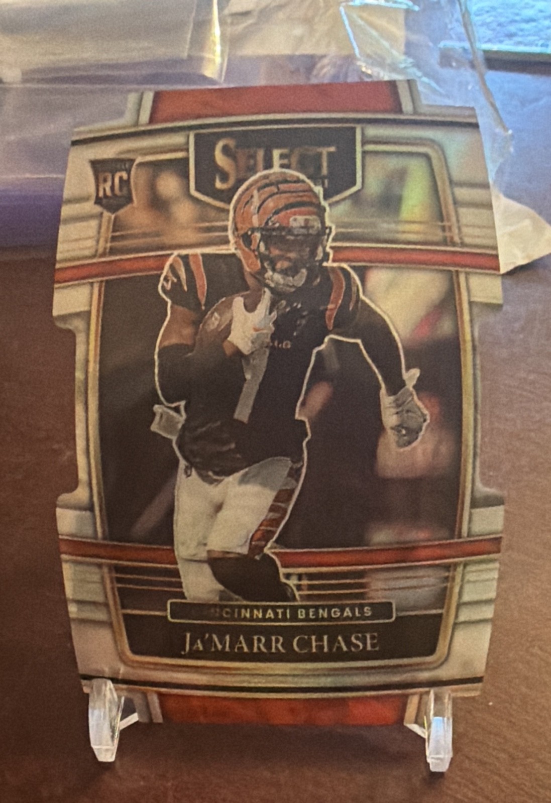 2021 Panini Select - Concourse Ja'Marr Chase #47 Silver Prizm Die-Cut (RC) 2021 Panini Select - Concourse Ja'Marr Chase #47 Silver Prizm Die-Cut (RC)