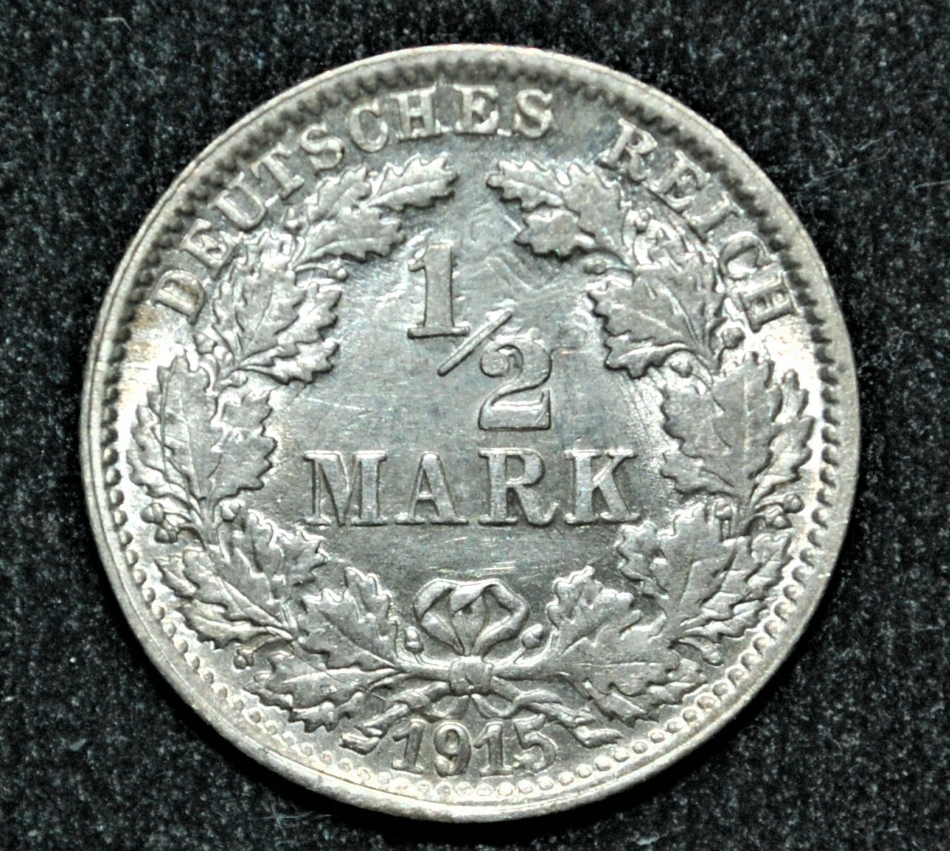 1915-F Germany: Empire 1/2 Mark with die clashes