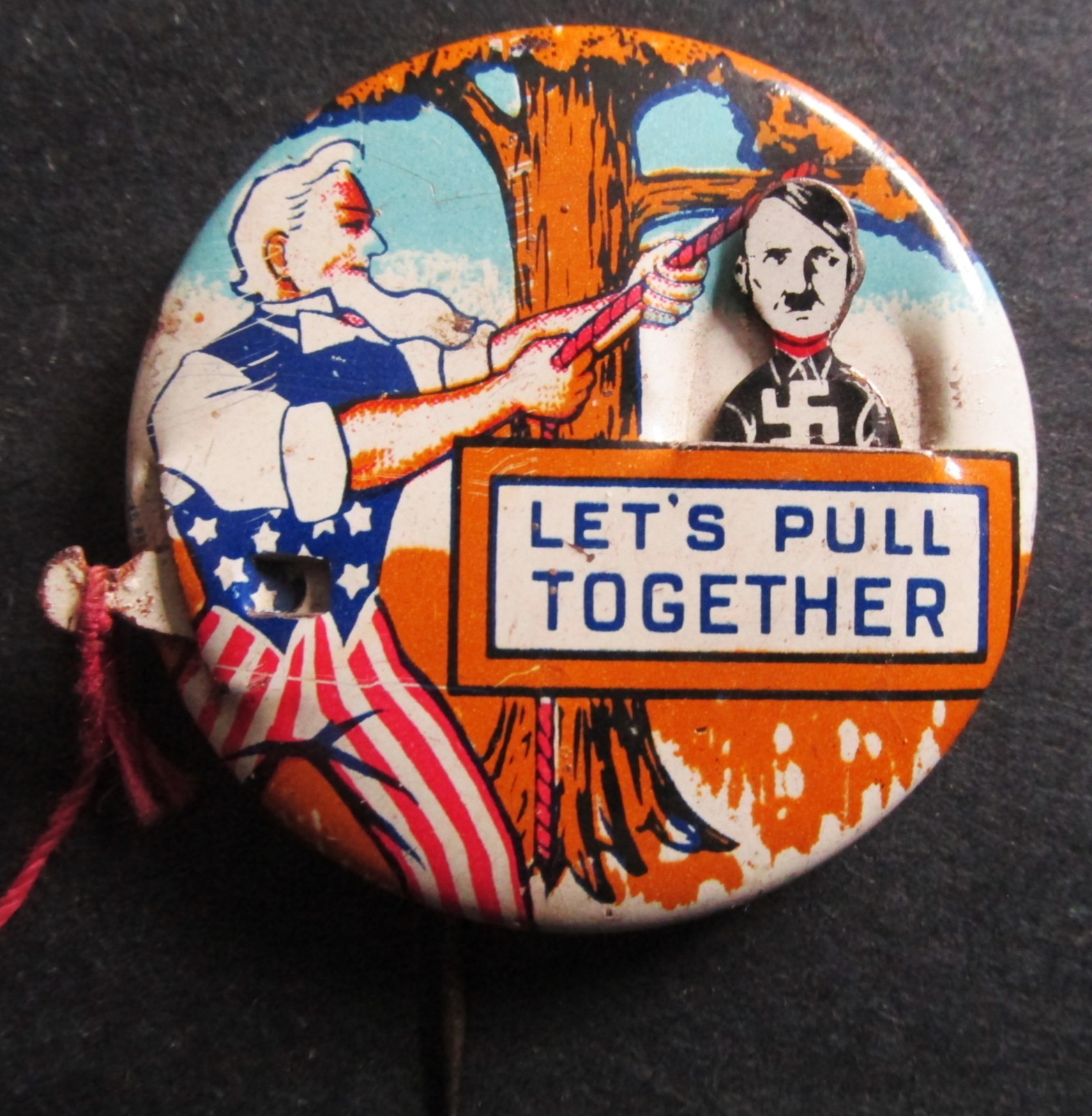 WW2 Homefront Moving Pinback Button LET\'S PULL TOGETHER Uncle Sam Hanging Hitler