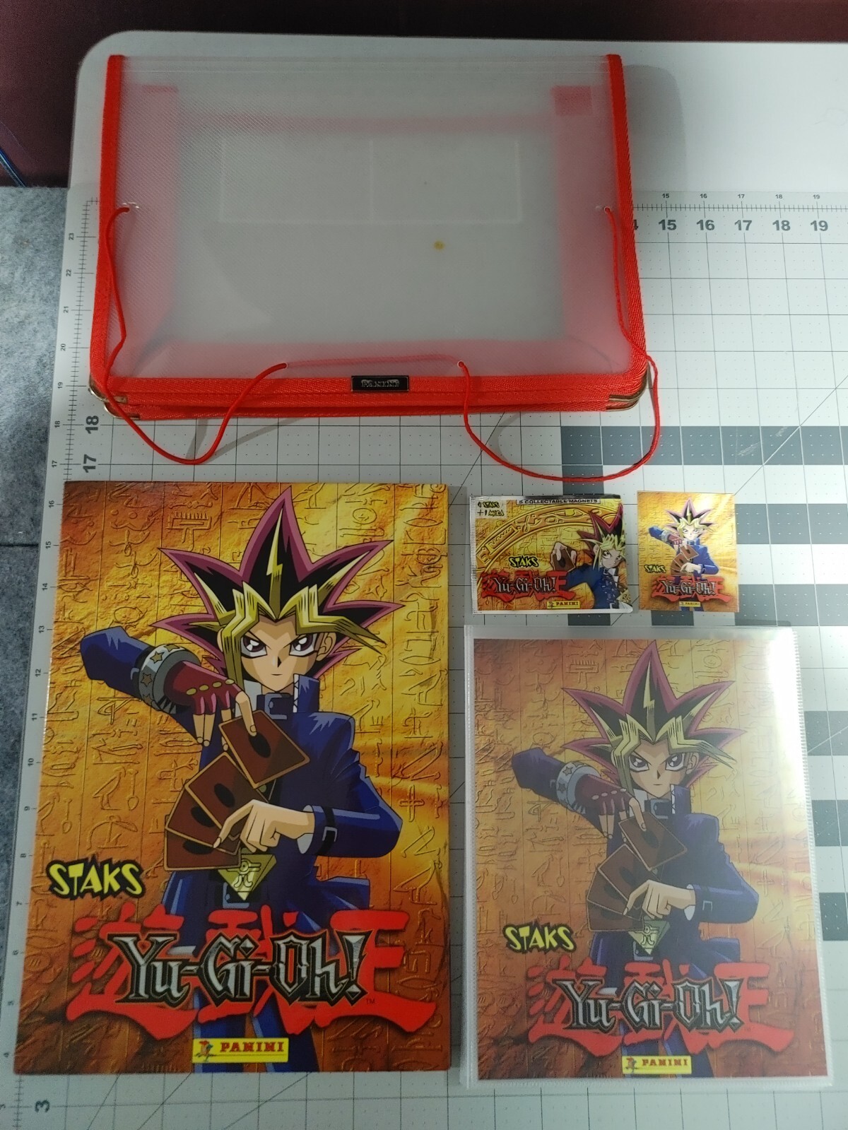 INCOMPLETE Yu-Gi-Oh Panini Staks Lot. Includes ALBUM, BOARD, STAKS AND BINDER. INCOMPLETE Yu-Gi-Oh Panini Staks Lot. Includes ALBUM, BOARD, STAKS AND BINDER.