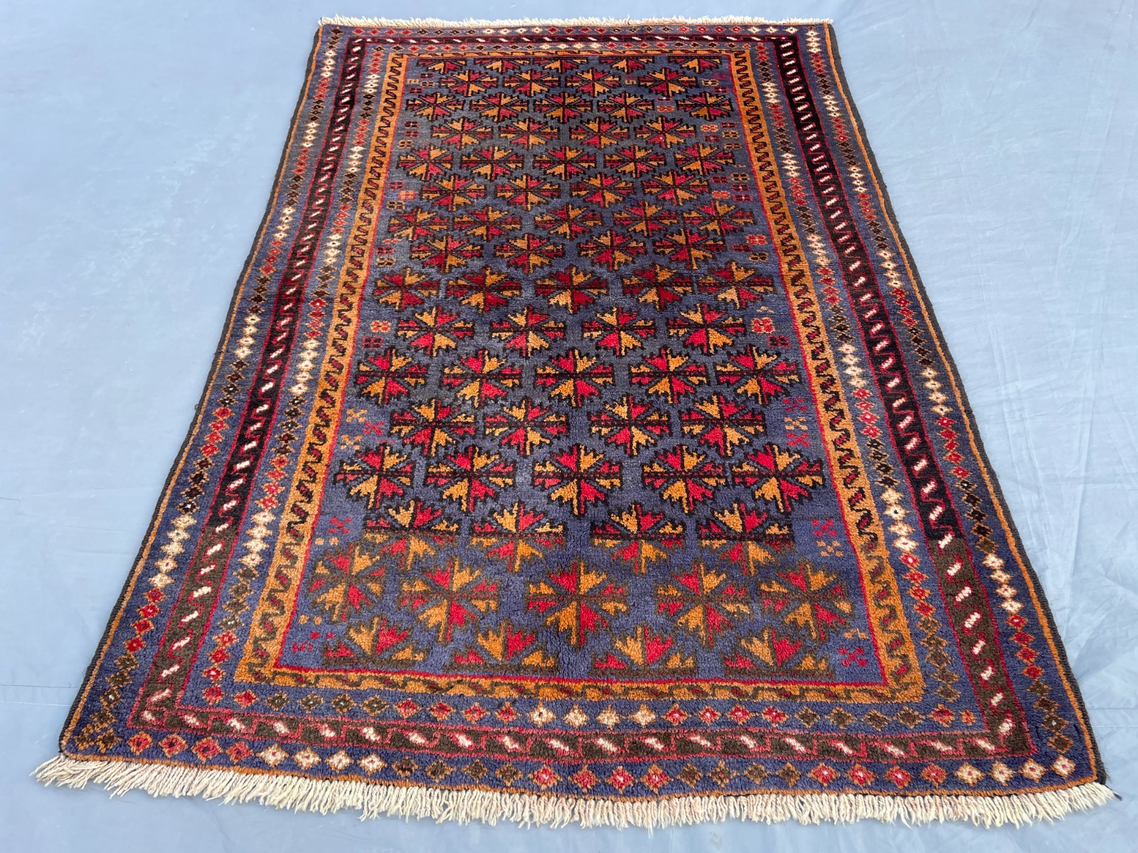 3X4 Vintage Afghan Baluchi Wool Rug with Repeating Star Motifs and Geometric