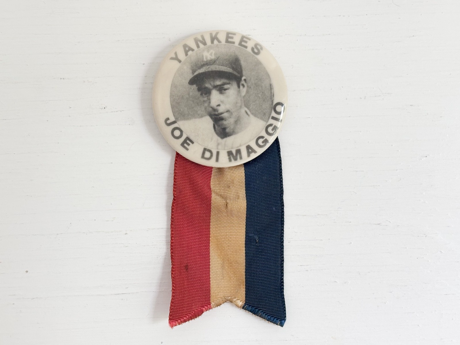 Late 40s / Early 50s Joe DiMaggio Stadium Souvenir Button with Tri-color Ribbon