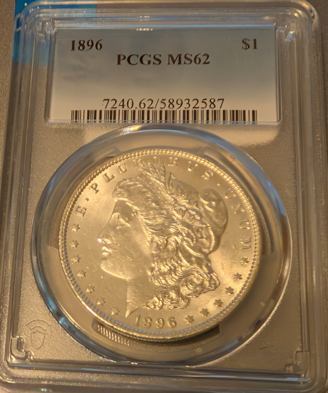 1886 P PCGS MS62 Morgan Silver Dollar, Blast White, looks better than the Grade 1886 P PCGS MS62 Morgan Silver Dollar, Blast White, looks better than the Grade
