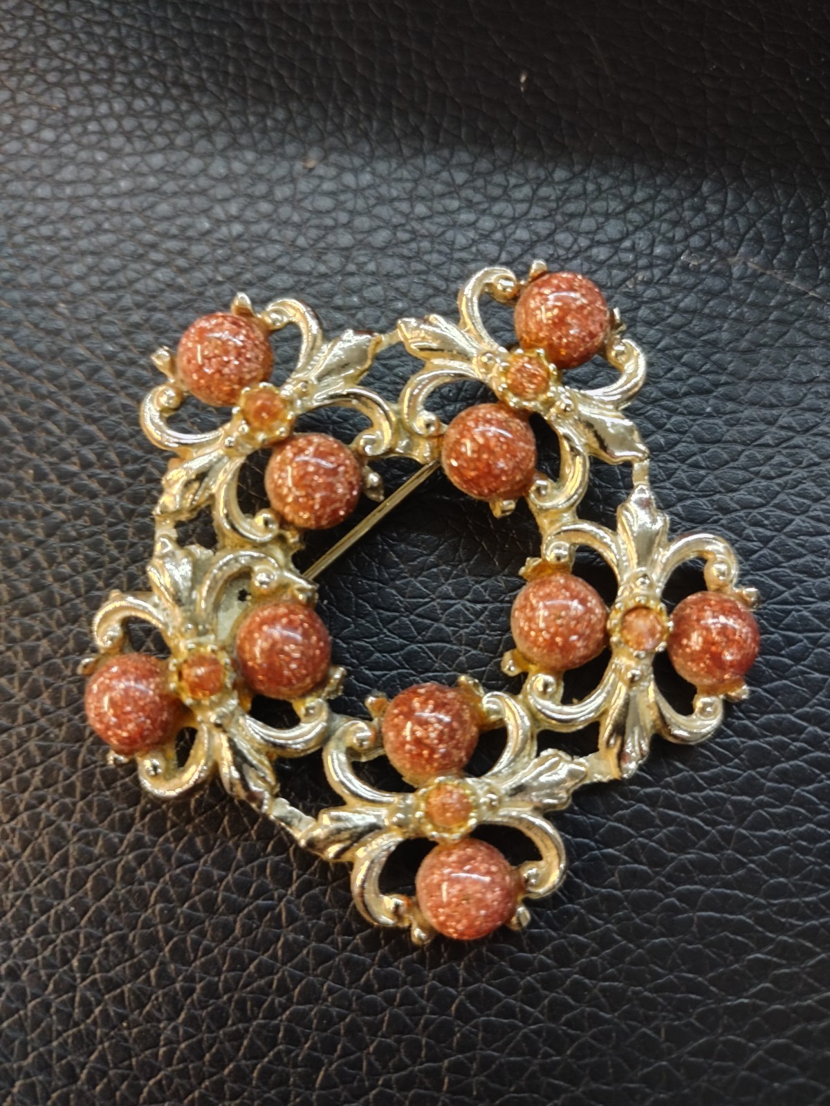 Unique vintage brooch with unique manmade gems not marked