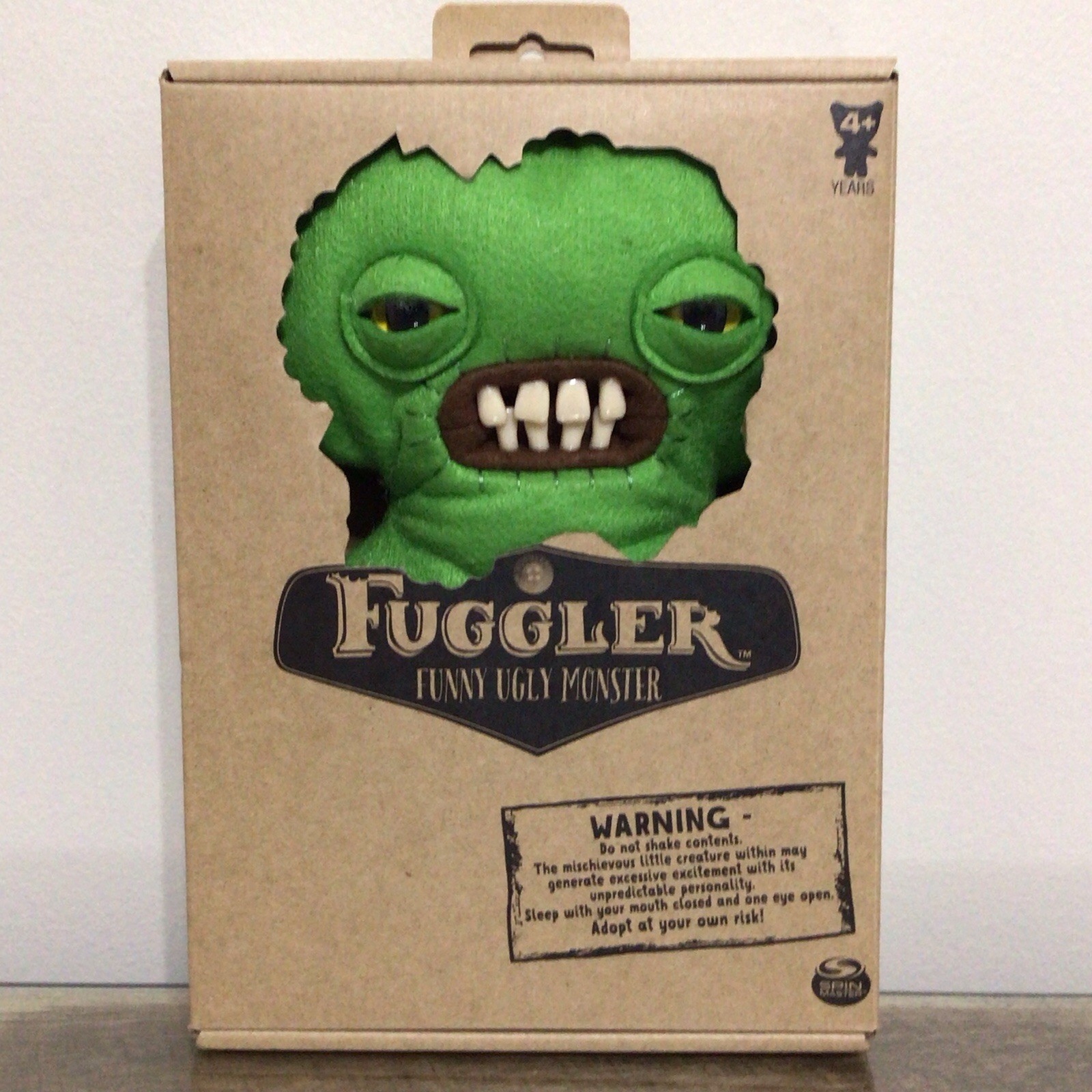 FUGGLER Funny Ugly Monster Green Squidge 9-inch Spin Master