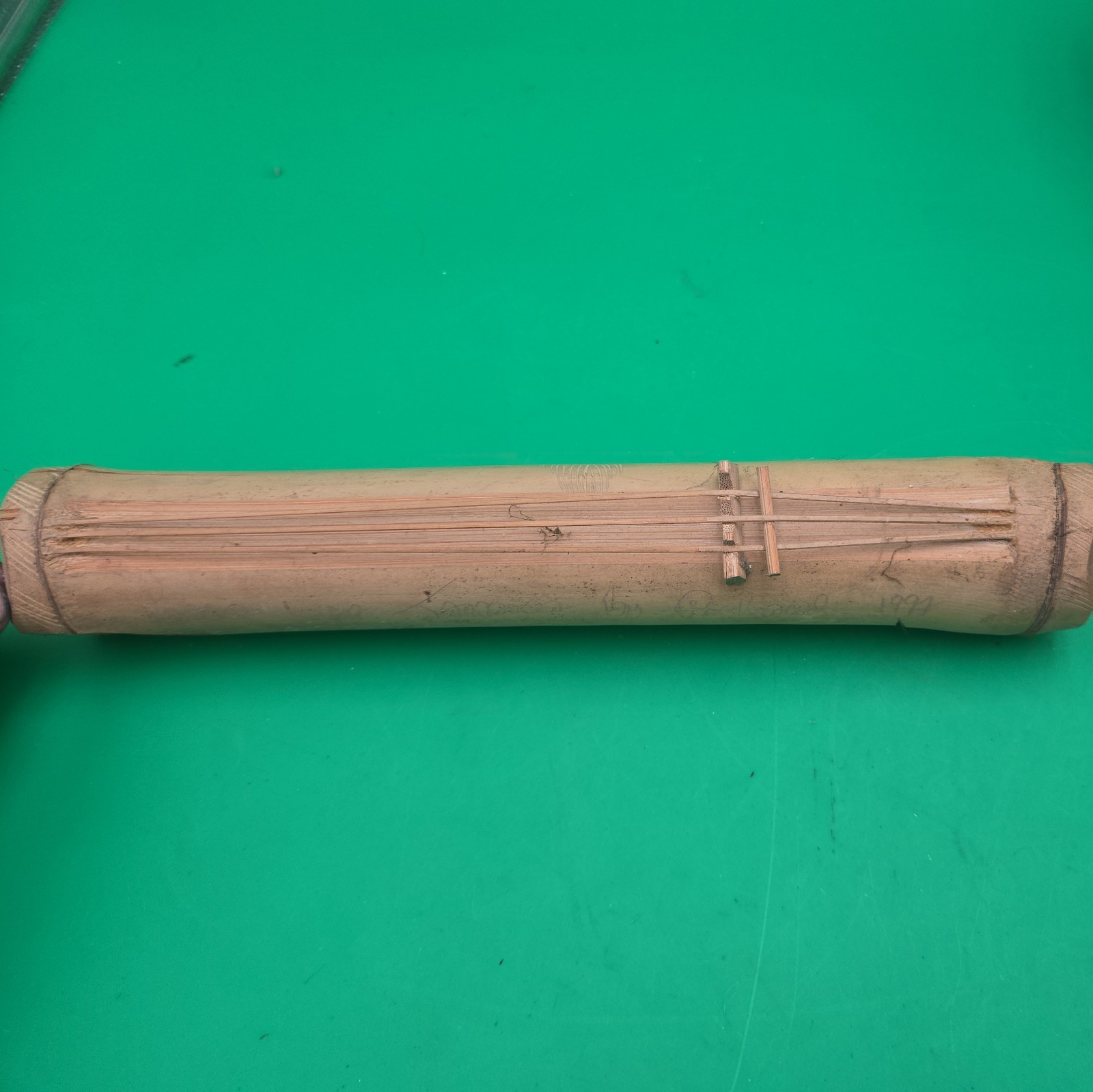 Jamaican Hand-Carved Hollow Bamboo Tube Zither Primitive Instrument 18” Jamaican Hand-Carved Hollow Bamboo Tube Zither Primitive Instrument 18”