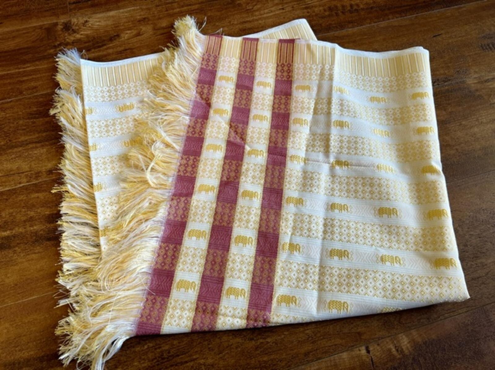 Elegant Woven Table Runner with Elephant Motif and Fringe