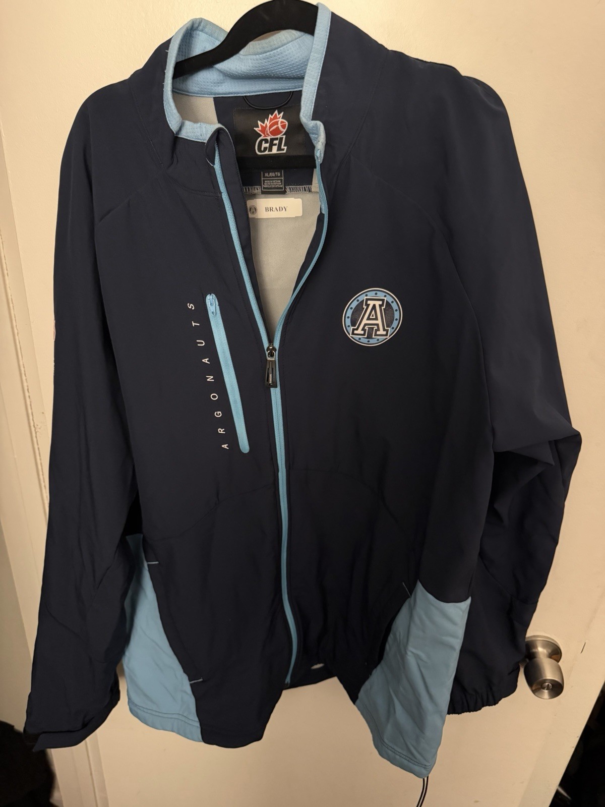 cfl football agnots game used jacket 