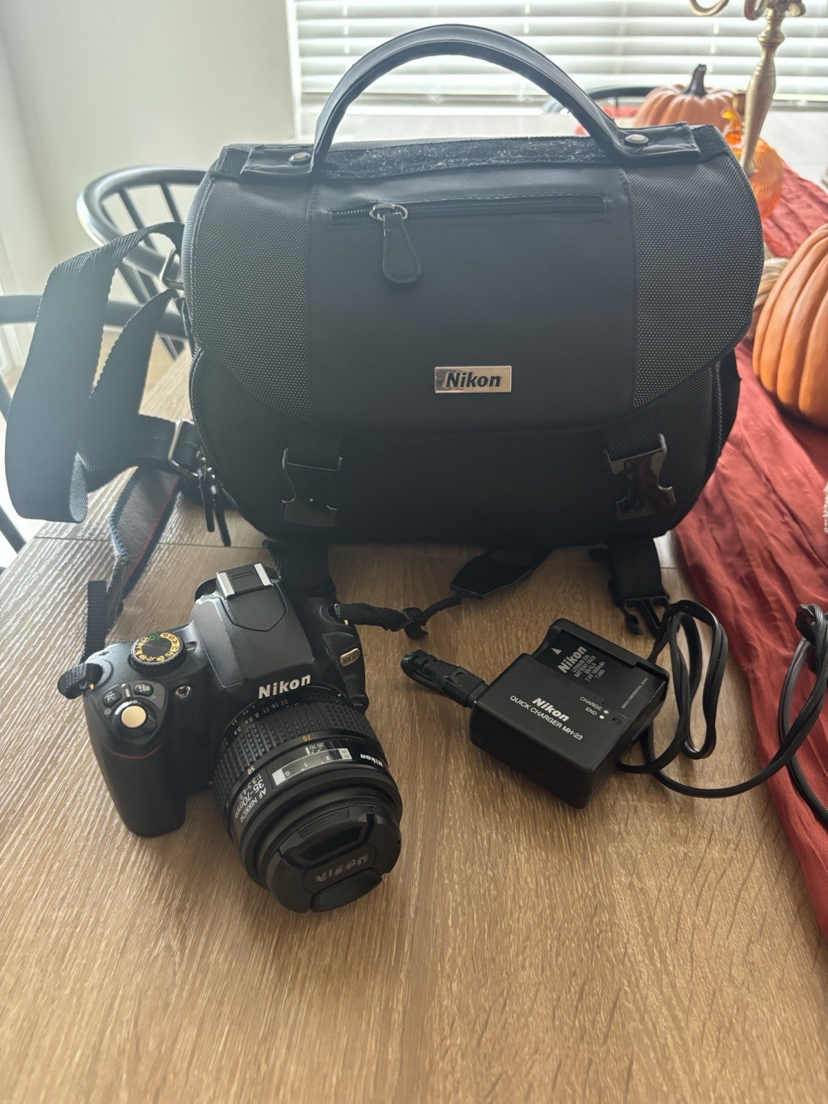 Nikon D60 DSLR Camera + AF Nikkor 35-70mm Lens + Nikon Camera Bag & Charger
