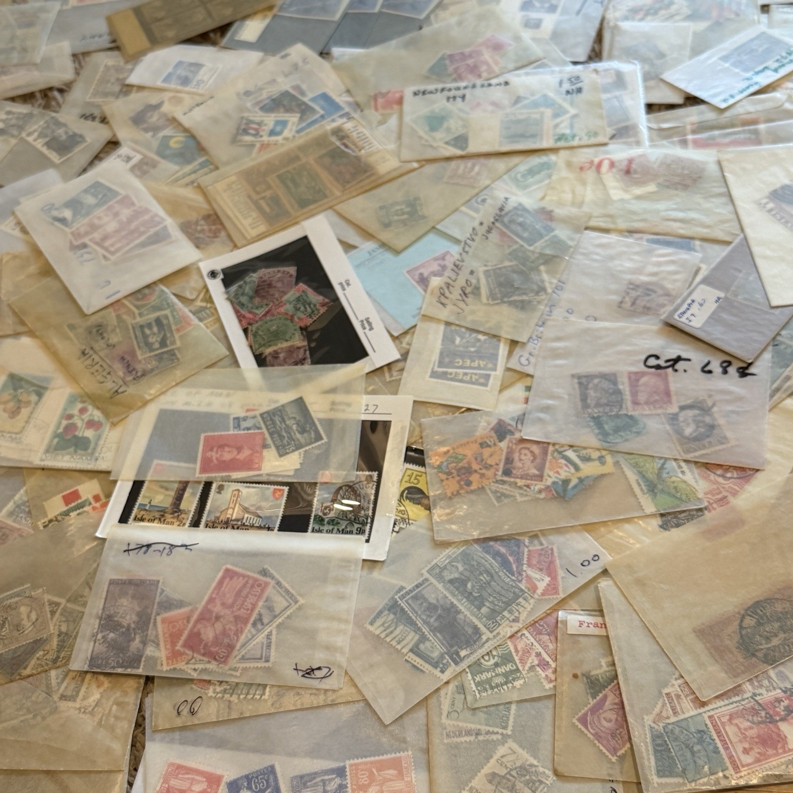 MASSIVE LOT OF WORLDWIDE STAMPS IN GLASSINES MINT, USED, OVERPRINTS ETC NO US MASSIVE LOT OF WORLDWIDE STAMPS IN GLASSINES MINT, USED, OVERPRINTS ETC NO US