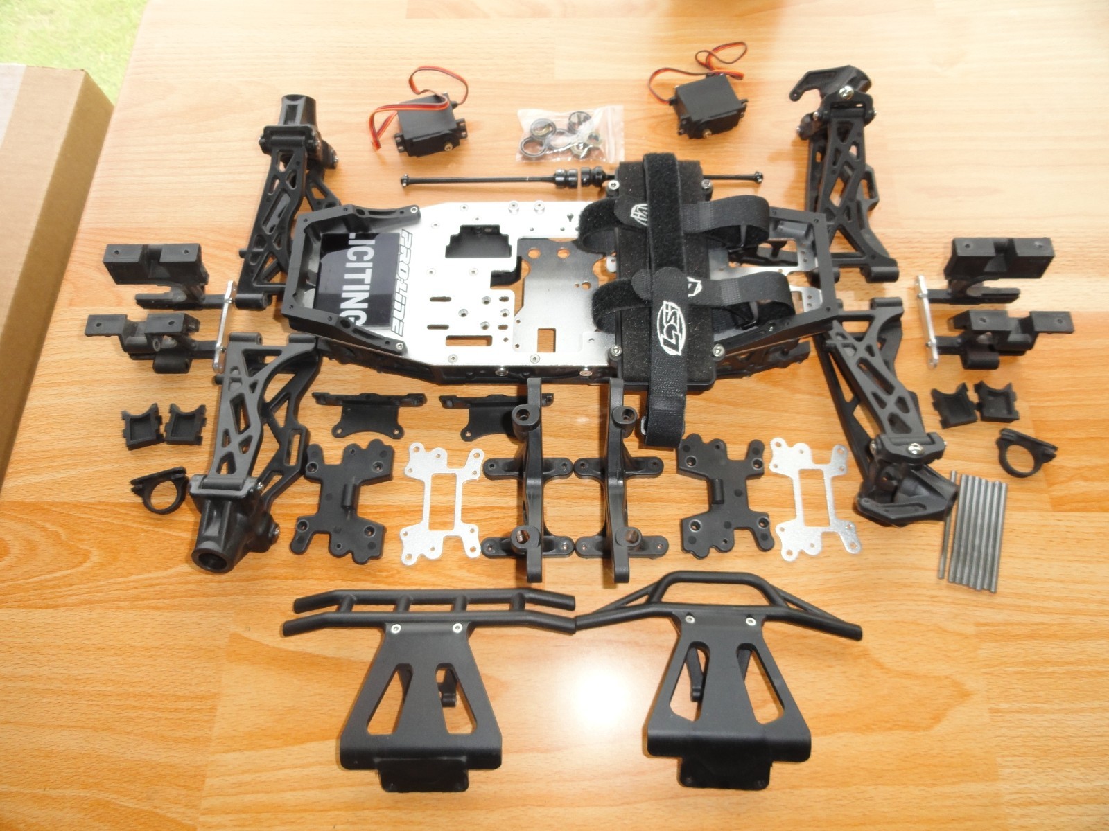 LOSI LST2 XXL-E CHASSIS + OTHER PARTS, ELECTRIC CONVERSION, SEE DETAILS BELOW. LOSI LST2 XXL-E CHASSIS + OTHER PARTS, ELECTRIC CONVERSION, SEE DETAILS BELOW.