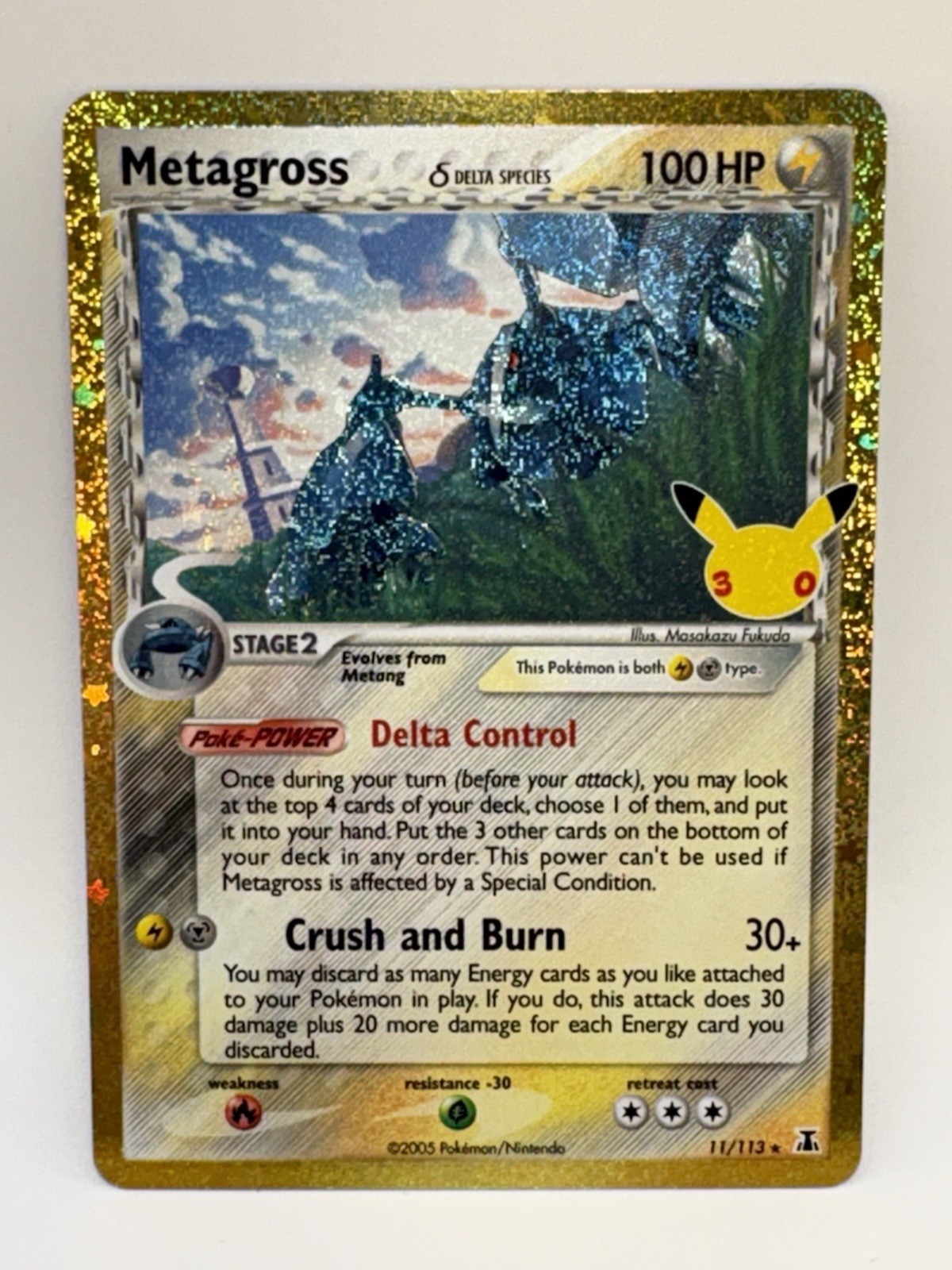 Pokemon TCG 30th Anniversary Metagross 11/113 Delta Species Gold Border Mint