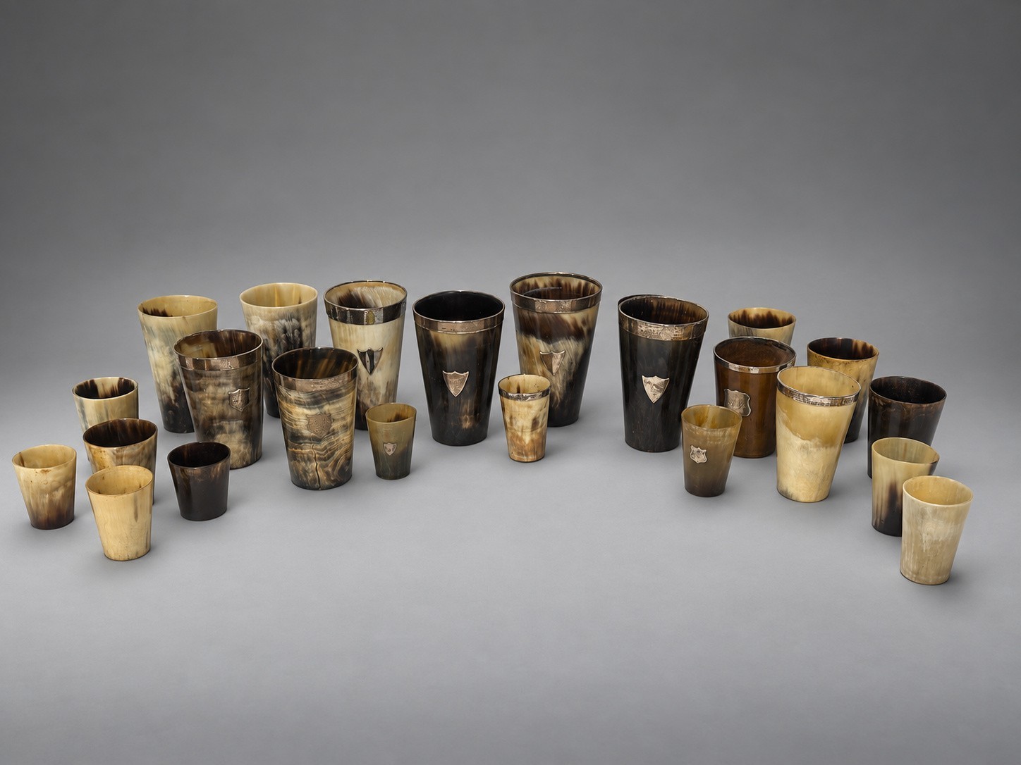 Collection of 24 Antique British Horn Beakers, Including Silver-Mounted
