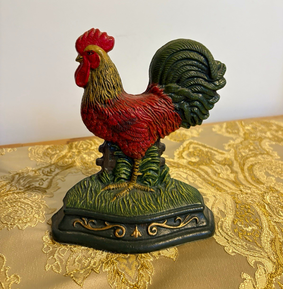 This is a vintage hand-painted cast iron rooster figurine by Wright Studios.