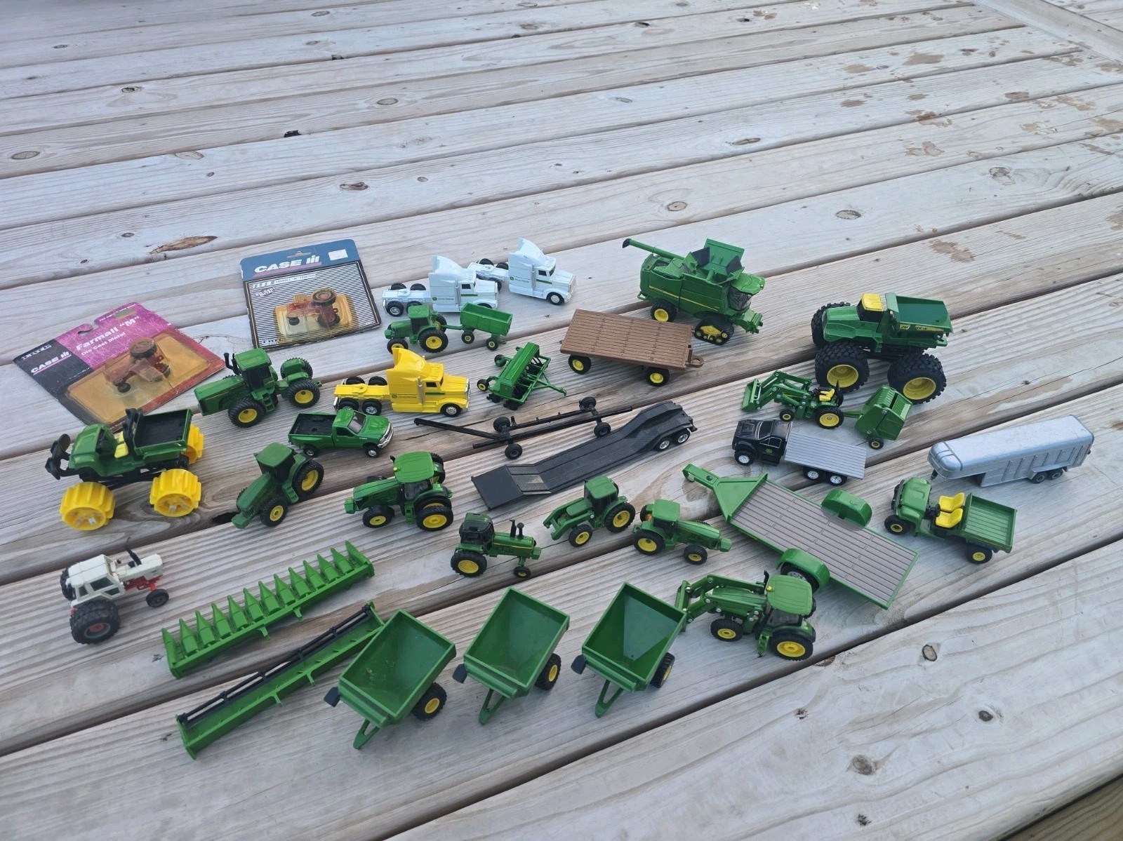 Vintage Ertl John Deere, Case, 1/64 scale diecast farm tractor, implement lot