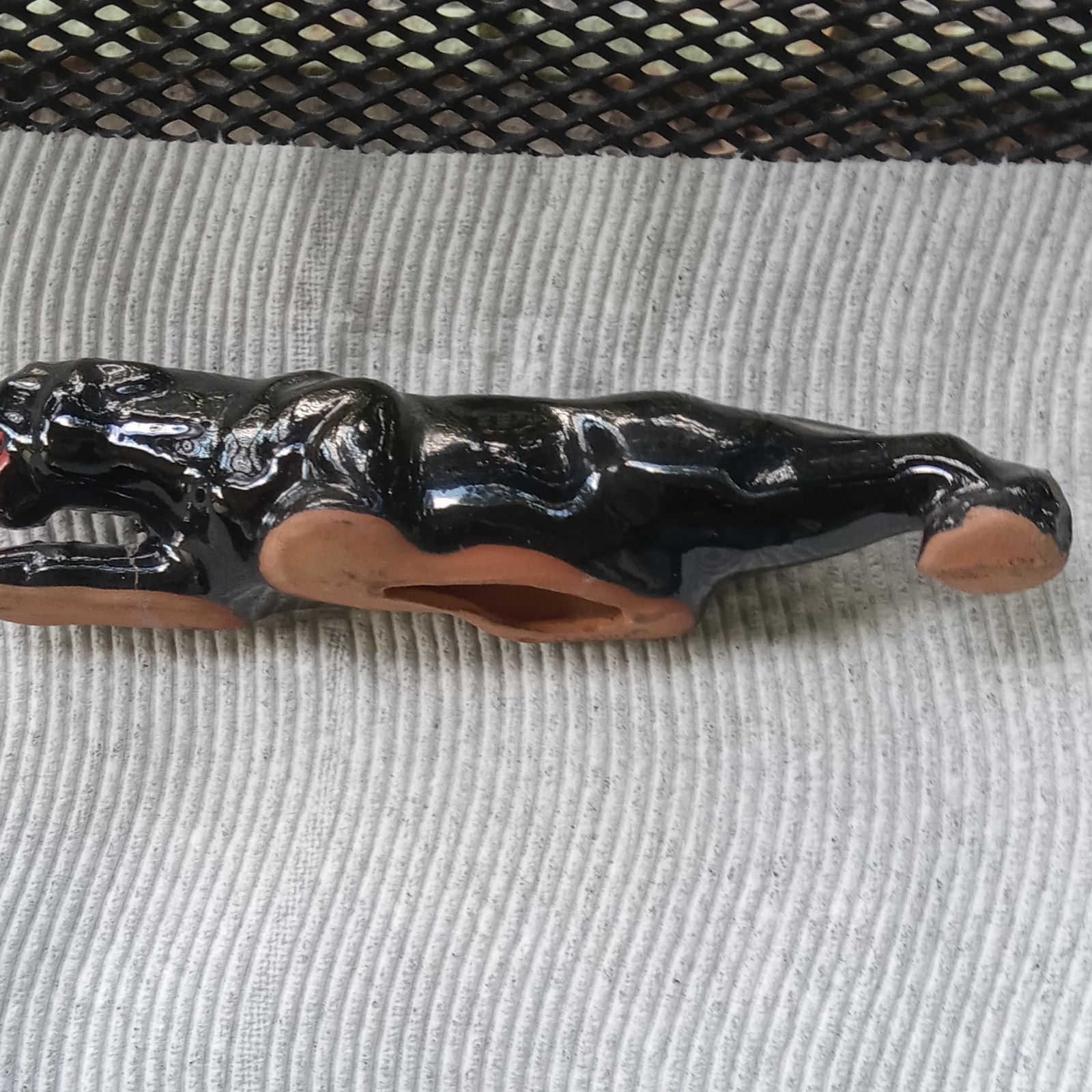 Glossy Clay Black Panther Figurine with Red Mouth and Yellow Eyes Glossy Clay Black Panther Figurine with Red Mouth and Yellow Eyes