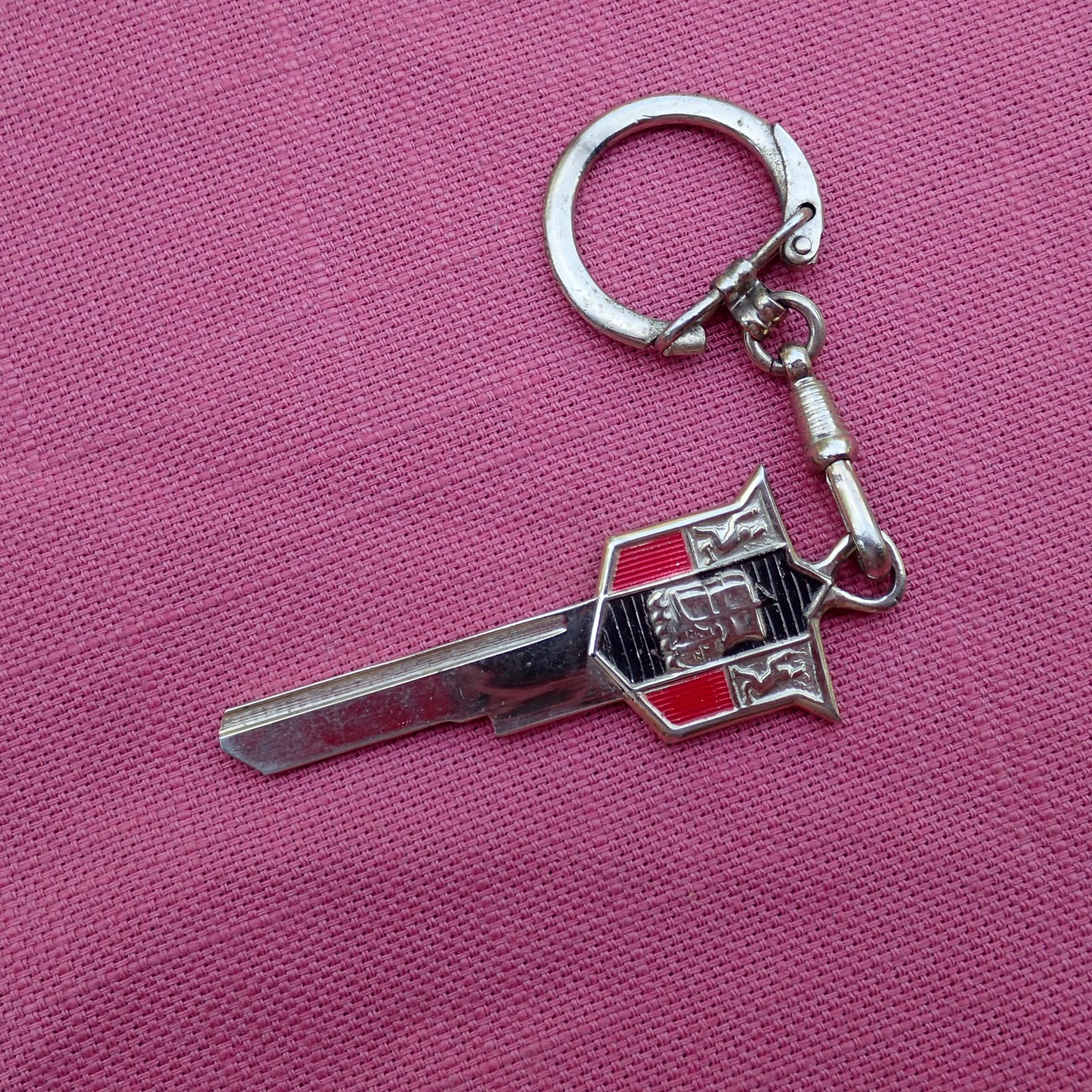 Vintage 1956-67 Plymouth Mayflower gold crest key blank and ring, uncut NOS
