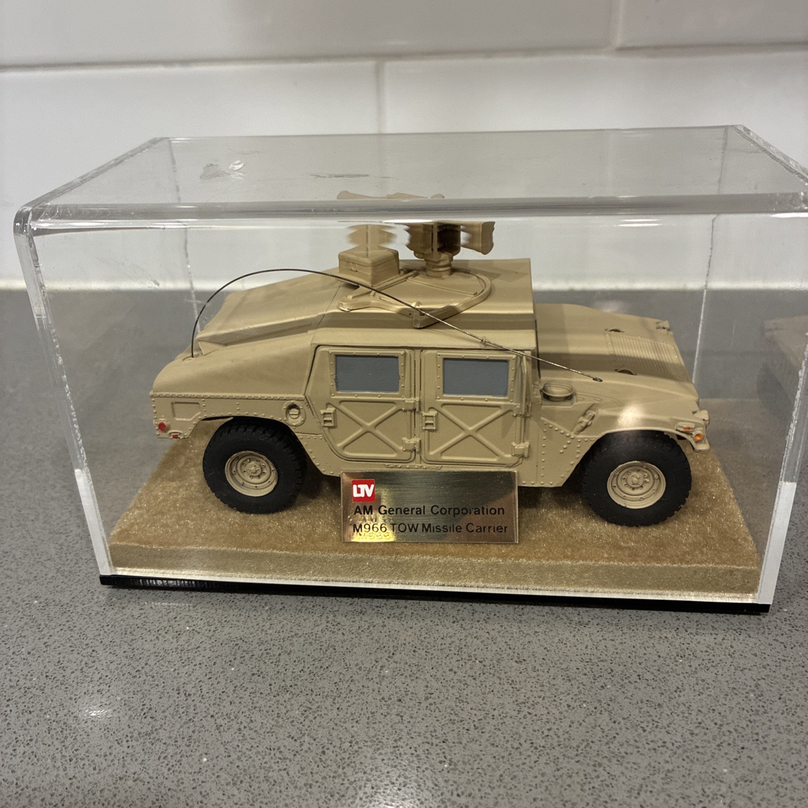 Diecast replica of an AM General M966 TOW Missile Carrier