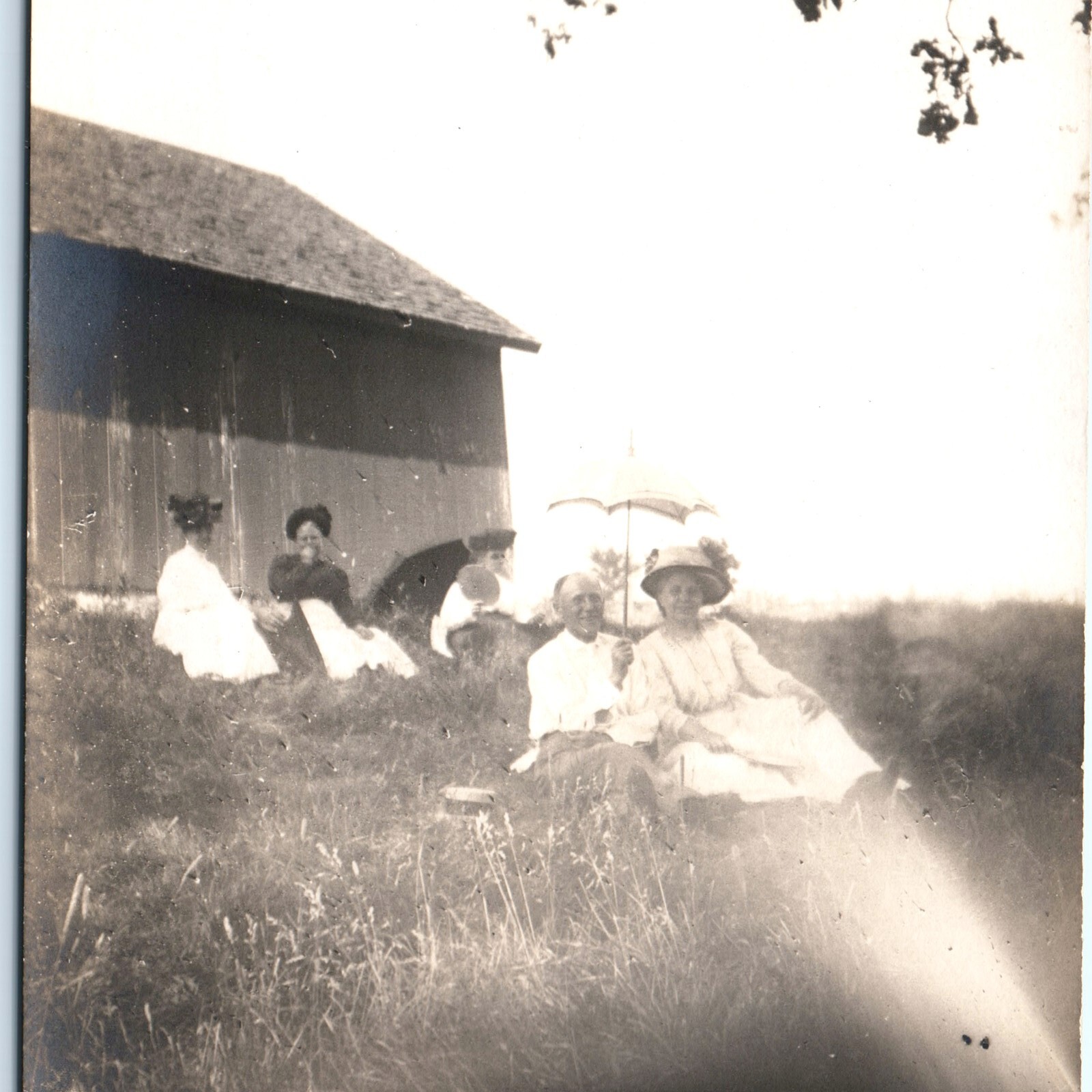 c1910s Outdoor Picnic RPPC Postcard People On Grass Barn Parasol Sun Umbrella c1910s Outdoor Picnic RPPC Postcard People On Grass Barn Parasol Sun Umbrella