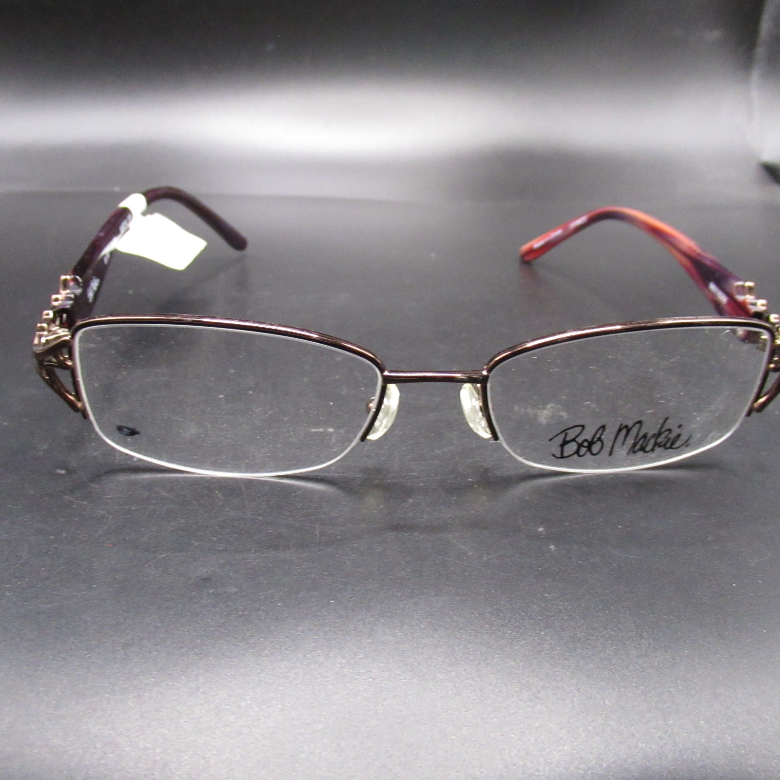 Bob Mackie B100 BRN 52-18-135 Women\'s Half-Rim Bronze Eyeglass Frames with Bob Mackie B100 BRN 52-18-135 Women\'s Half-Rim Bronze Eyeglass Frames with