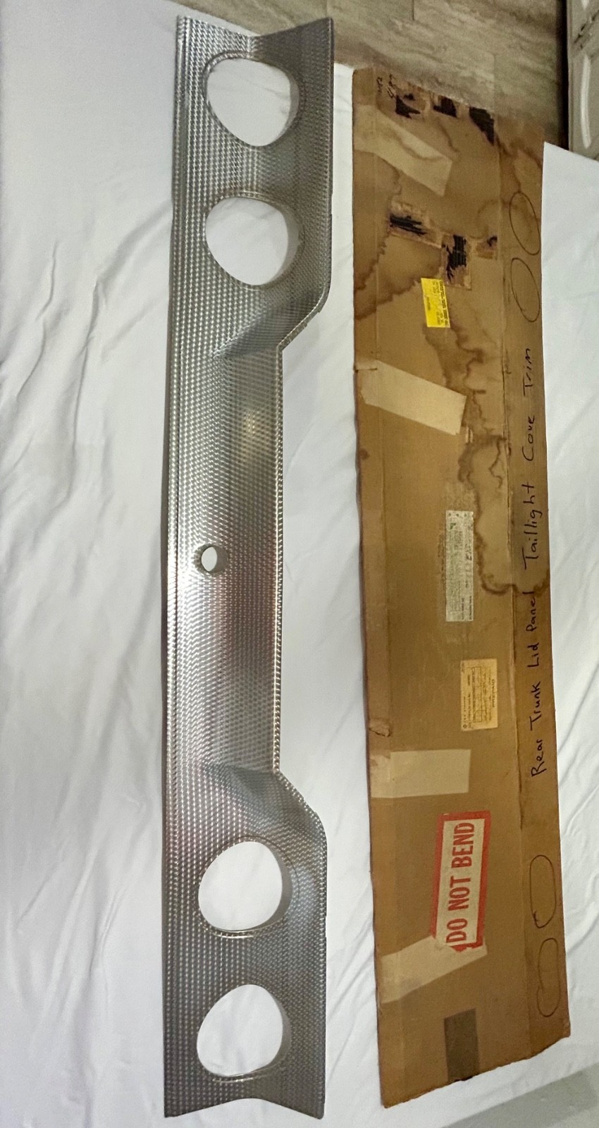 1963 impala NOS ss tailight panel cove with box