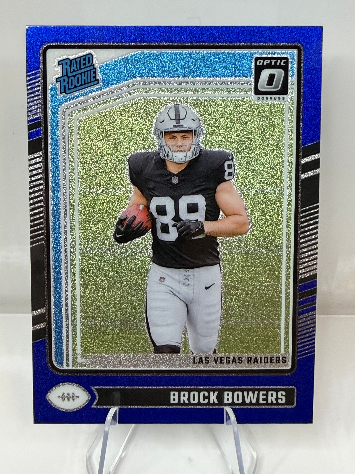 2024 Panini Donruss Optic Brock Bowers Blue Glitter Rated Rookie SSP #215 Raider