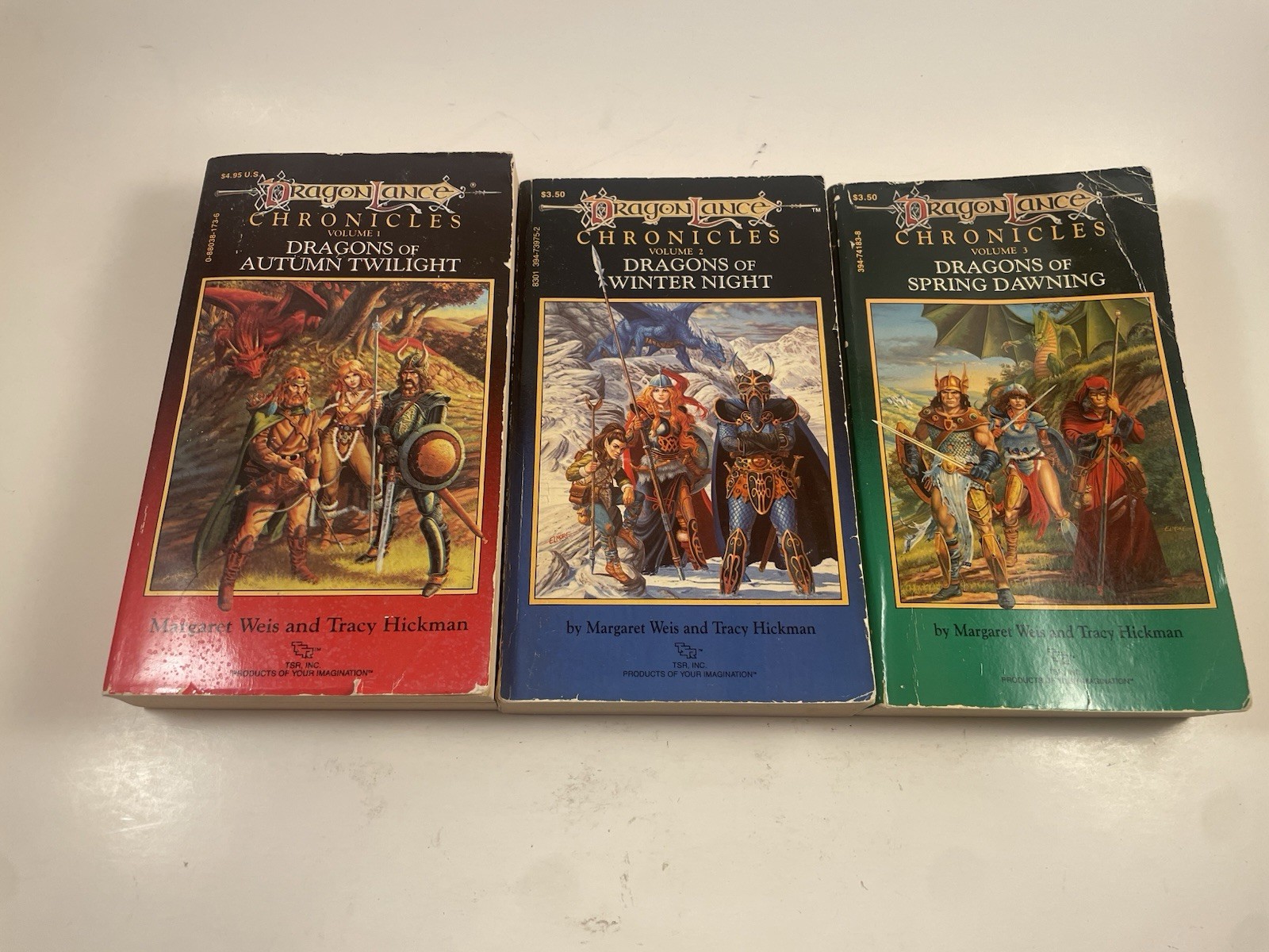 DragonLance Chronicles Trilogy PB Weis & Hickman 1984-85 TSR D&D Matching Spines DragonLance Chronicles Trilogy PB Weis & Hickman 1984-85 TSR D&D Matching Spines