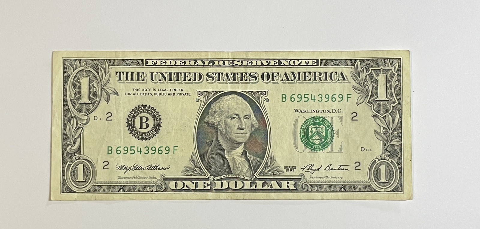 Circulated 1993 $1  Dollar Bill Serial Number B69543969F - Misaligned Slightly