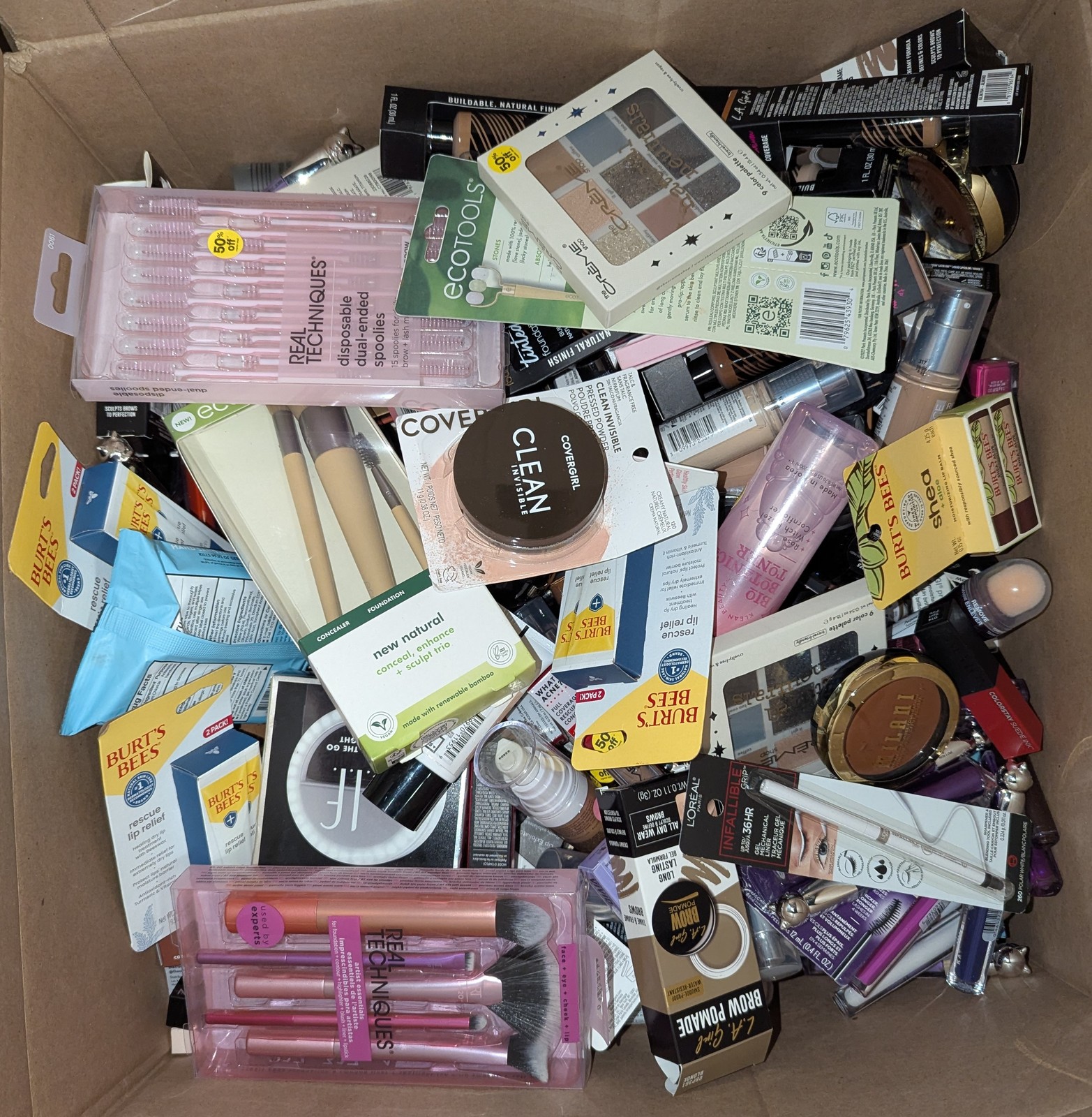 WHOLESALE LOT OF 100 PIECE ASSORTED NAME BRAND COSMETICS