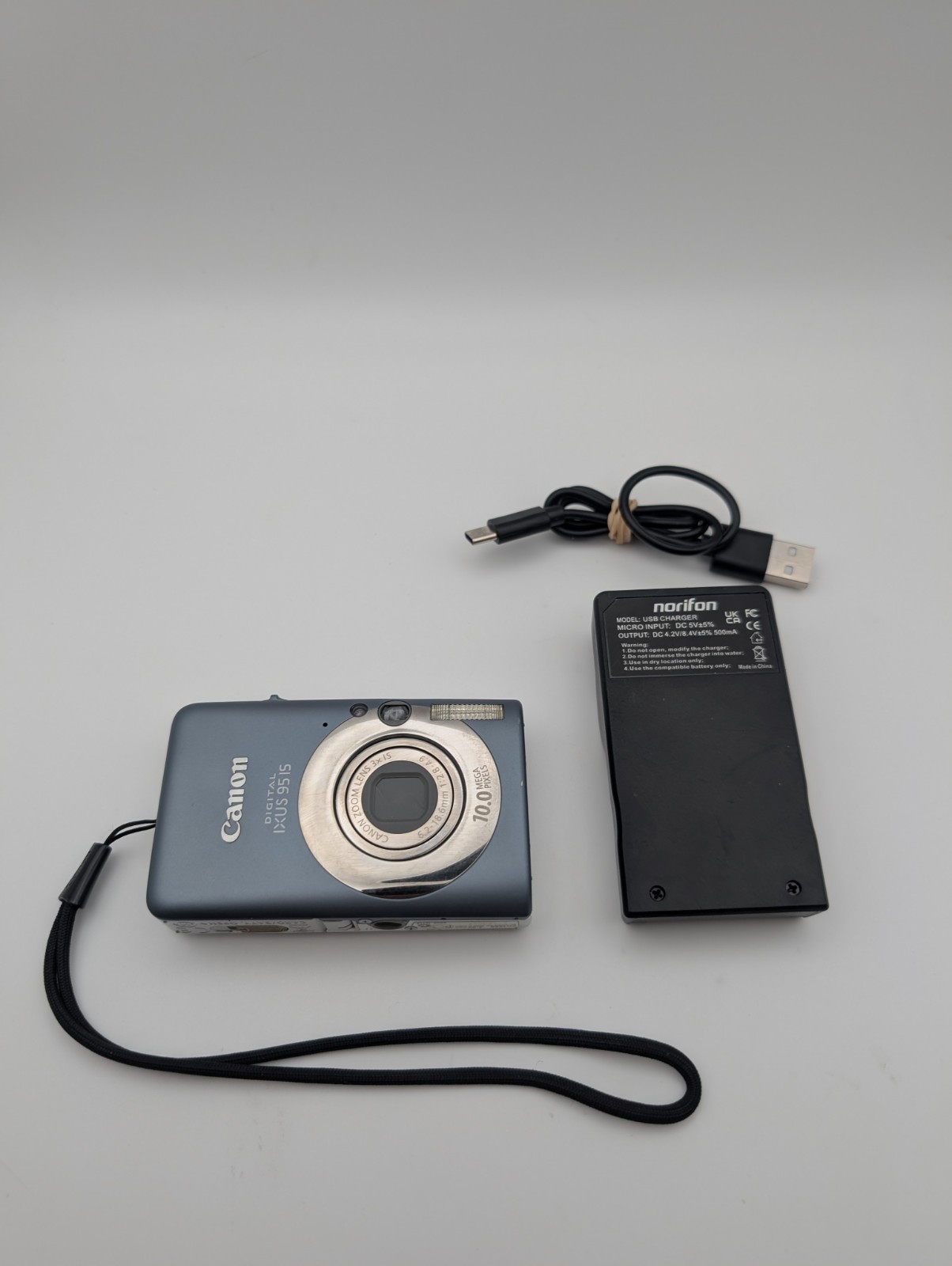 Canon IXUS 95 / PowerShot SD1200 Digital Camera - Fully Working Blue Great Cond
