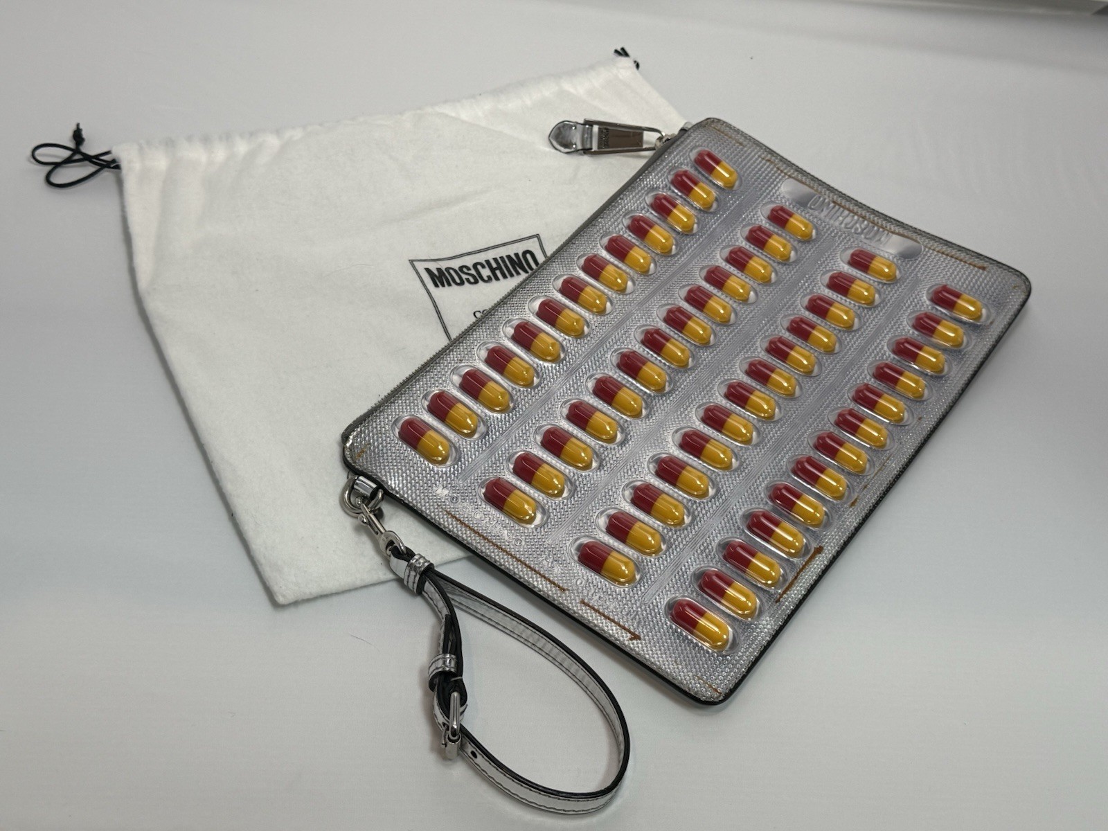 Moschino Couture Jeremy Scott Capsule Pill Blister Pack Silver Clutch Wristlet