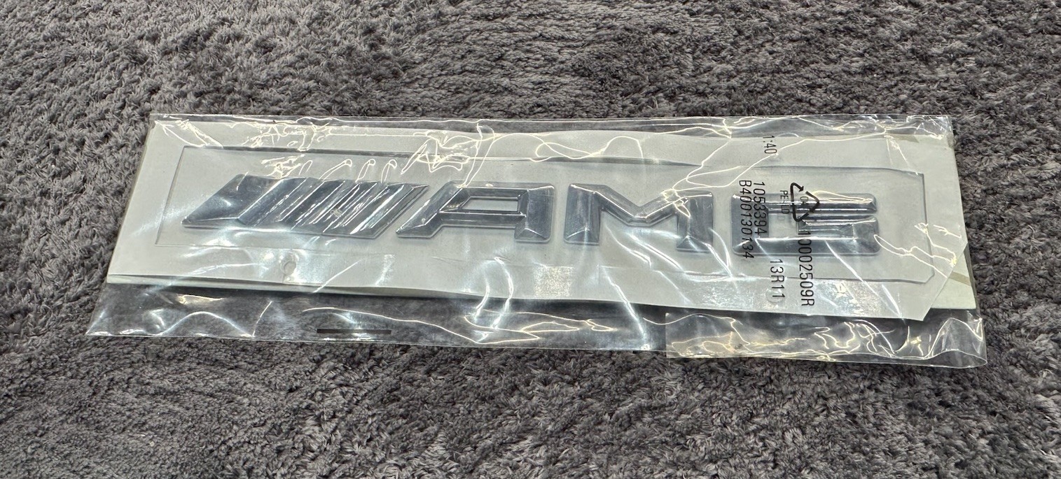 GENUINE MERCEDES AMG TRUNK LID EMBLEM MODEL DESIGNATION BRAND NEW