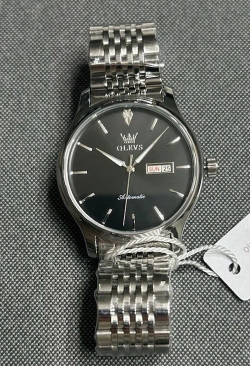 OLEVS Men's Automatic w/ Black Dial. Silver Stainless Steel, 41mm