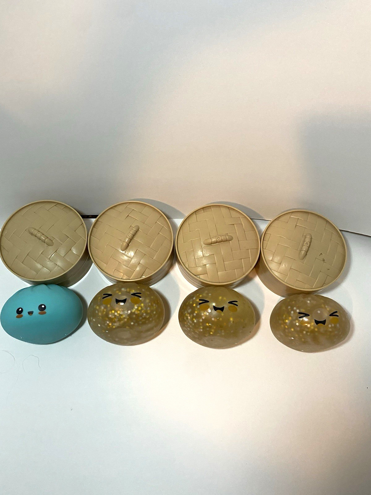 4 Dumplings-3 Gold glitter, 1 Light blue- All with Containers