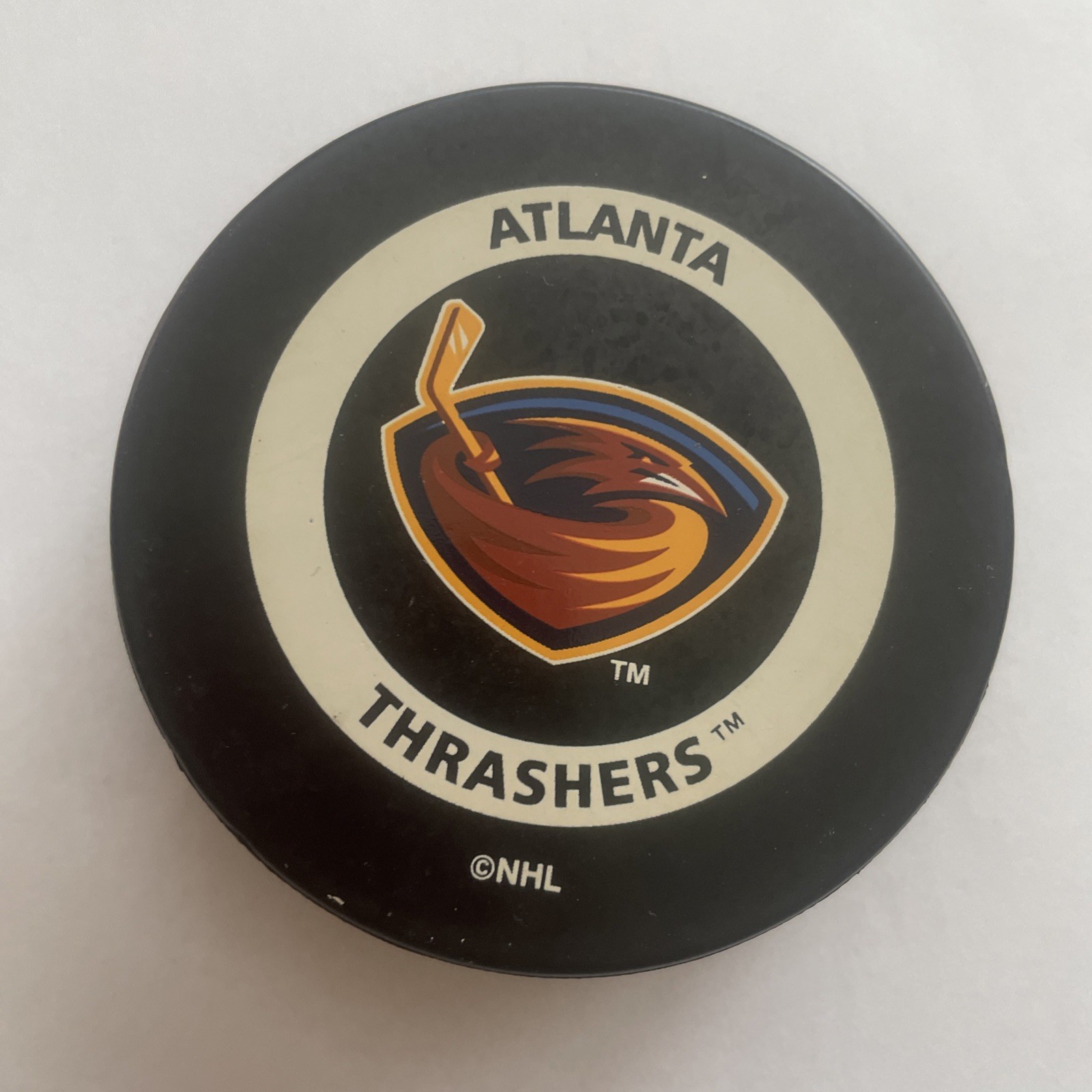 Vintage 1996-99 Atlanta Thrashers Official NHL Game Puck. Orange Bettman Reverse Vintage 1996-99 Atlanta Thrashers Official NHL Game Puck. Orange Bettman Reverse